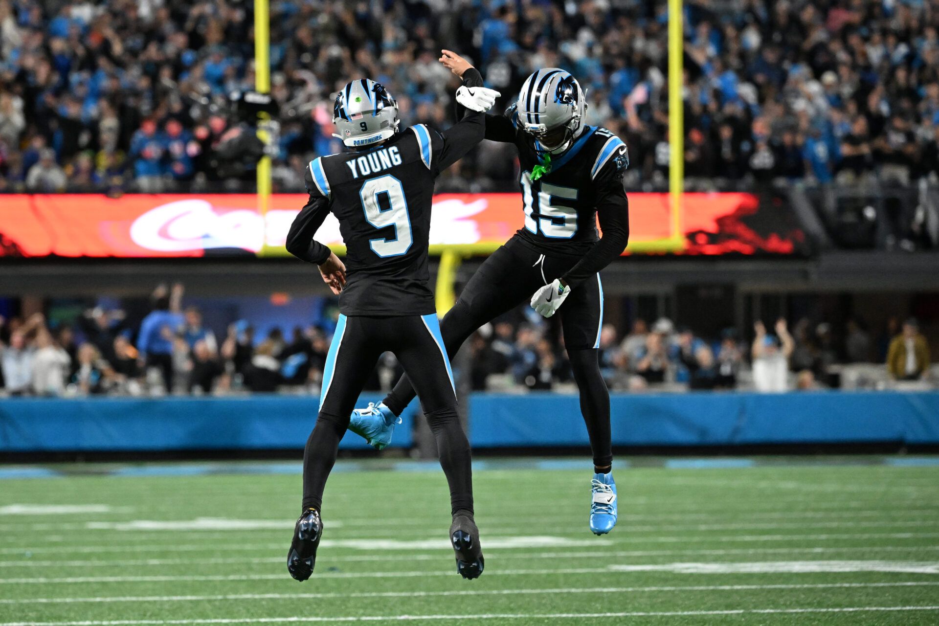 Carolina Panthers quarterback Bryce Young (9) and wide receiver Jimmy Horn Jr. (15) reacts in the fourth quarter in an NFC Wild Card Round game at Bank of America Stadium.