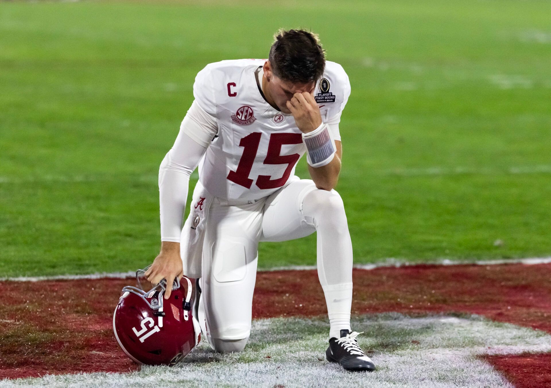 Alabama Crimson Tide quarterback Ty Simpson (15) reacts prior to the game against the Oklahoma Sooners during the CFP National Playoff First Round at Gaylord Family Oklahoma Memorial Stadium.