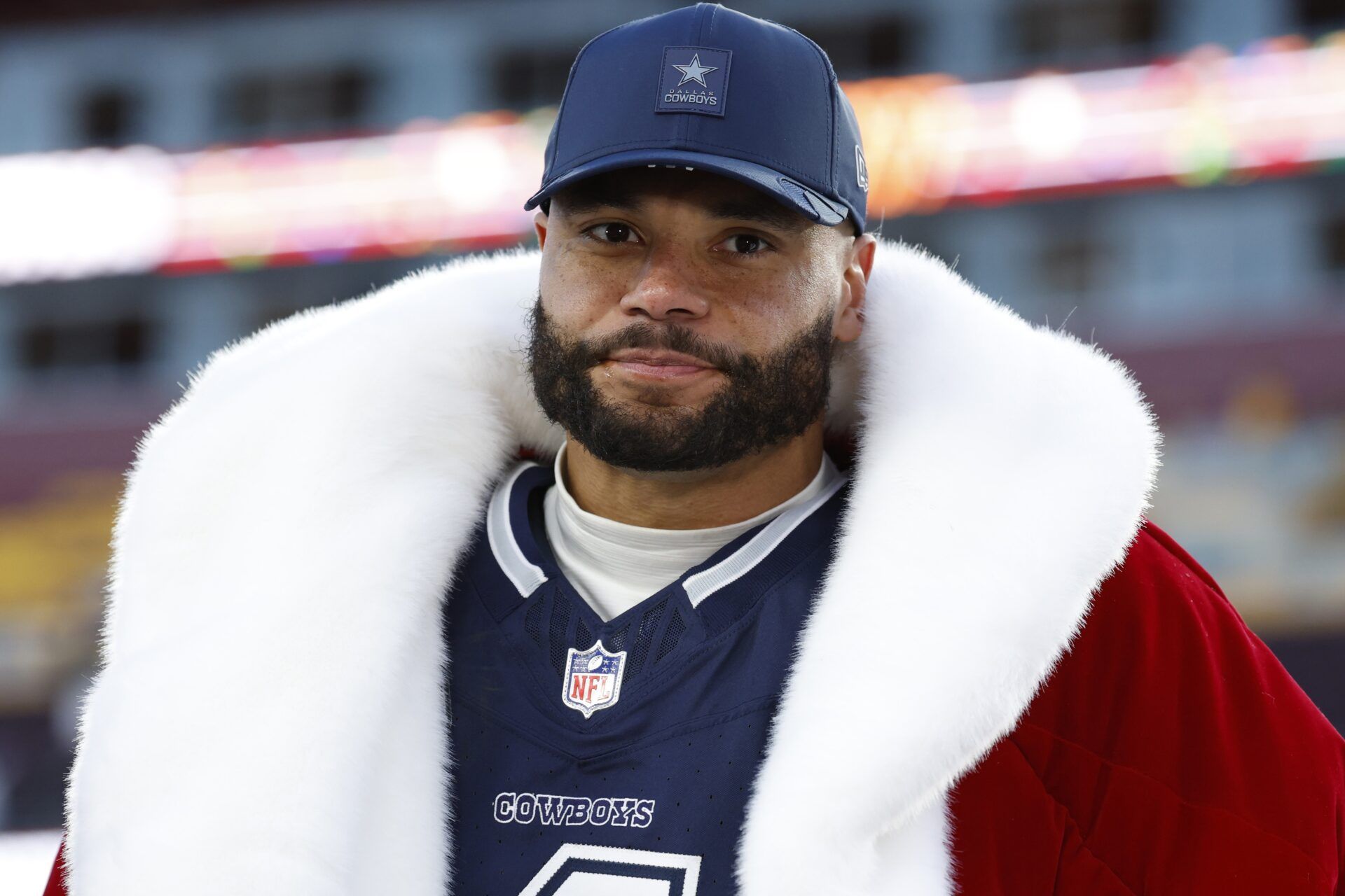 Dallas Cowboys quarterback Dak Prescott (4) is interviewed after defeating the Washington Commanders at Northwest Stadium.