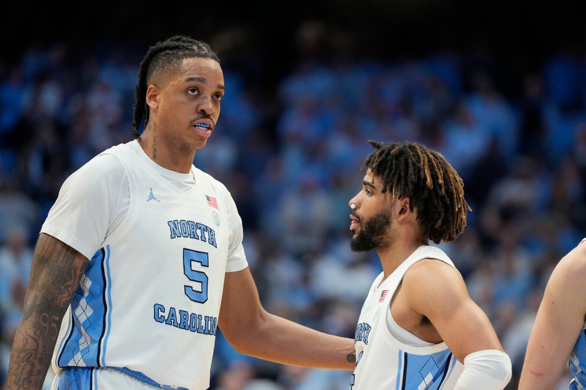 North Carolina Tar Heels forward Armando Bacot (5) with guard RJ Davis (4) in the second half at Dean E. Smith Center.