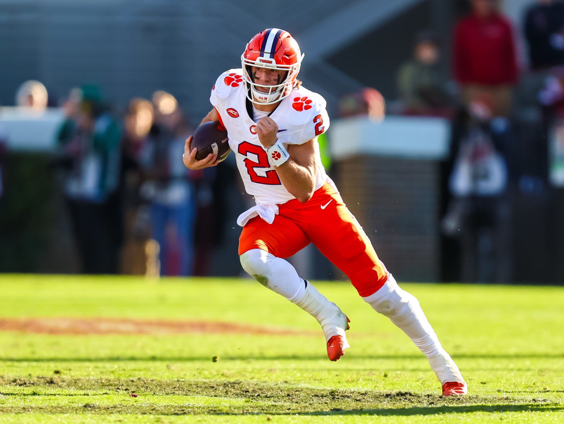 Clemson Tigers quarterback Cade Klubnik (2) rushes against the South Carolina Gamecocks in the second quarter at Williams-Brice Stadium.