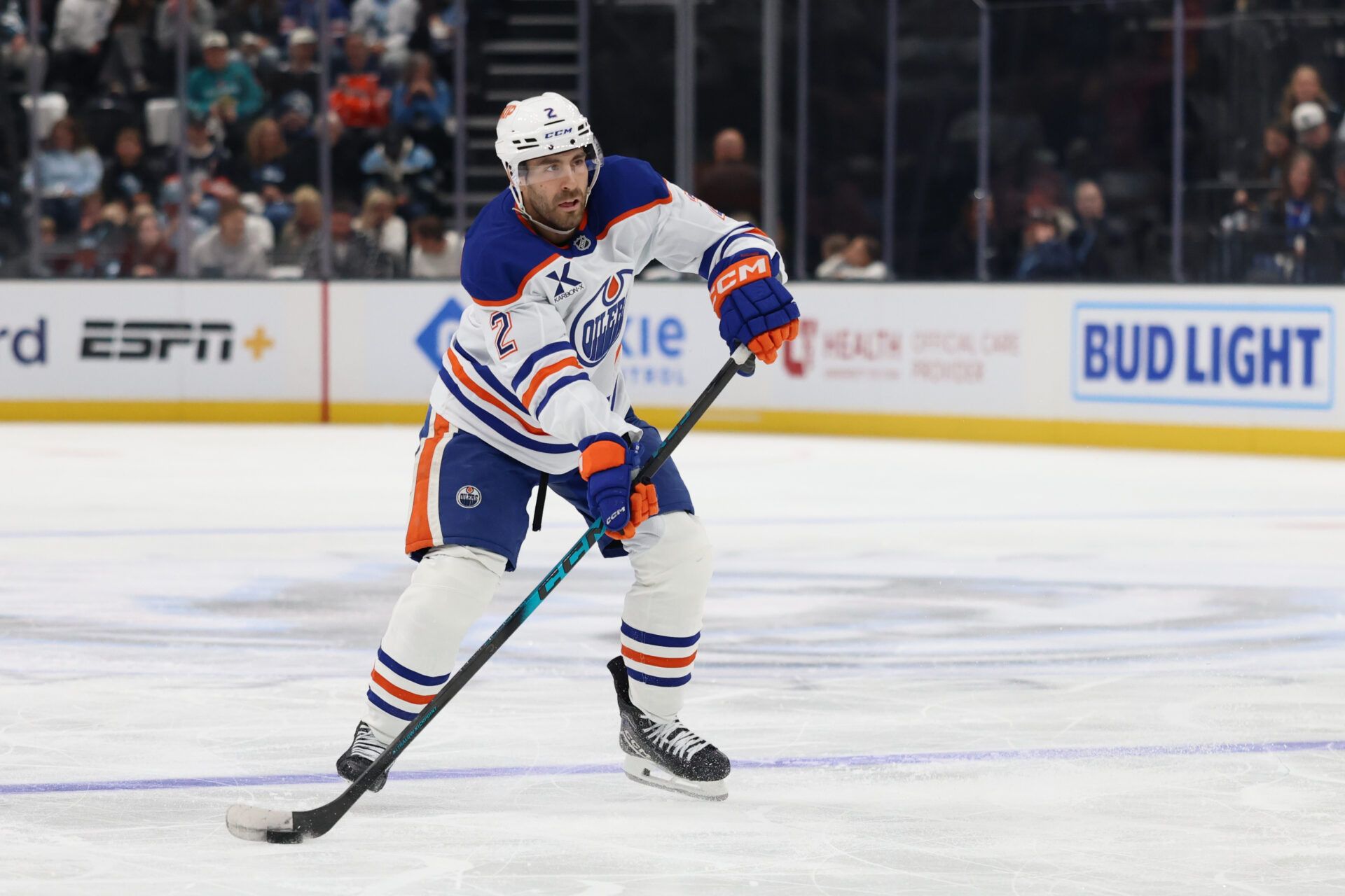 Edmonton Oilers defenseman Evan Bouchard (2) looks for a shot against the Utah Mammoth during the second period at Delta Center.