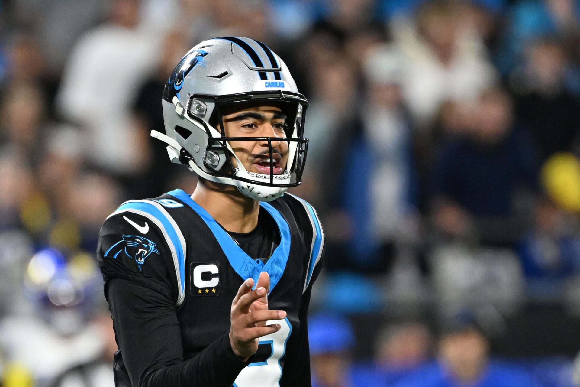 Carolina Panthers quarterback Bryce Young (9) reacts in the fourth quarter in an NFC Wild Card Round game at Bank of America Stadium.