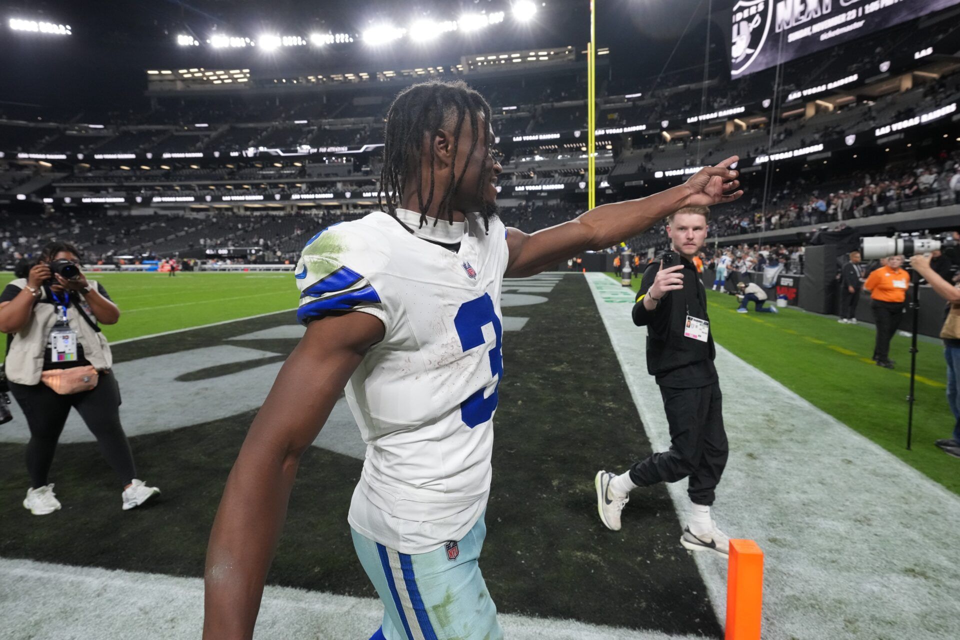 Dallas Cowboys wide receiver George Pickens (3) reacts towards the stands as he leaves the field following a game against the Las Vegas Raiders at Allegiant Stadium.