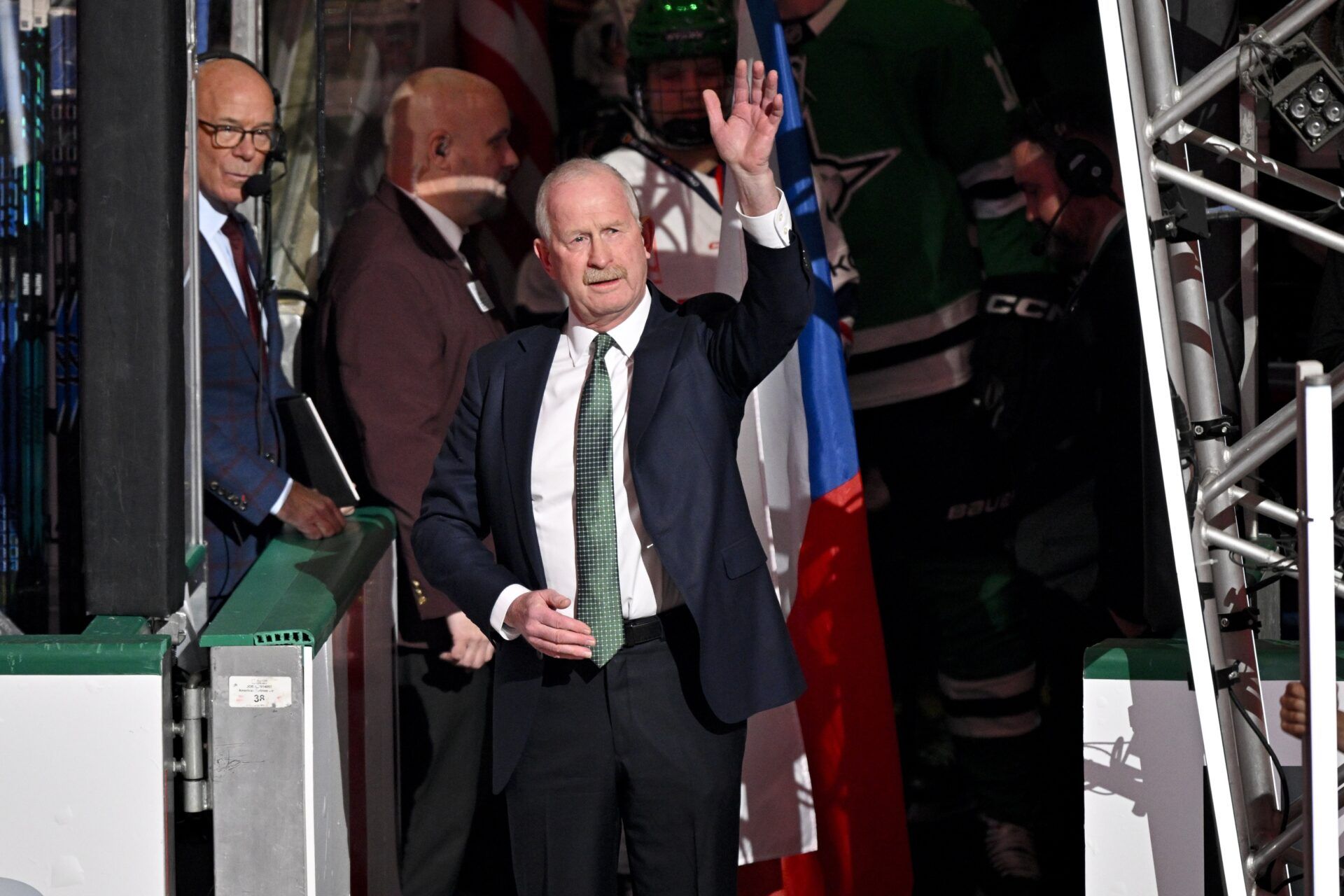 Dallas Stars general manager Jim Nill is celebrate as the Stars honor their 2026 Winter Olympics hockey players before the game against the St. Louis Blues at the American Airlines Center.