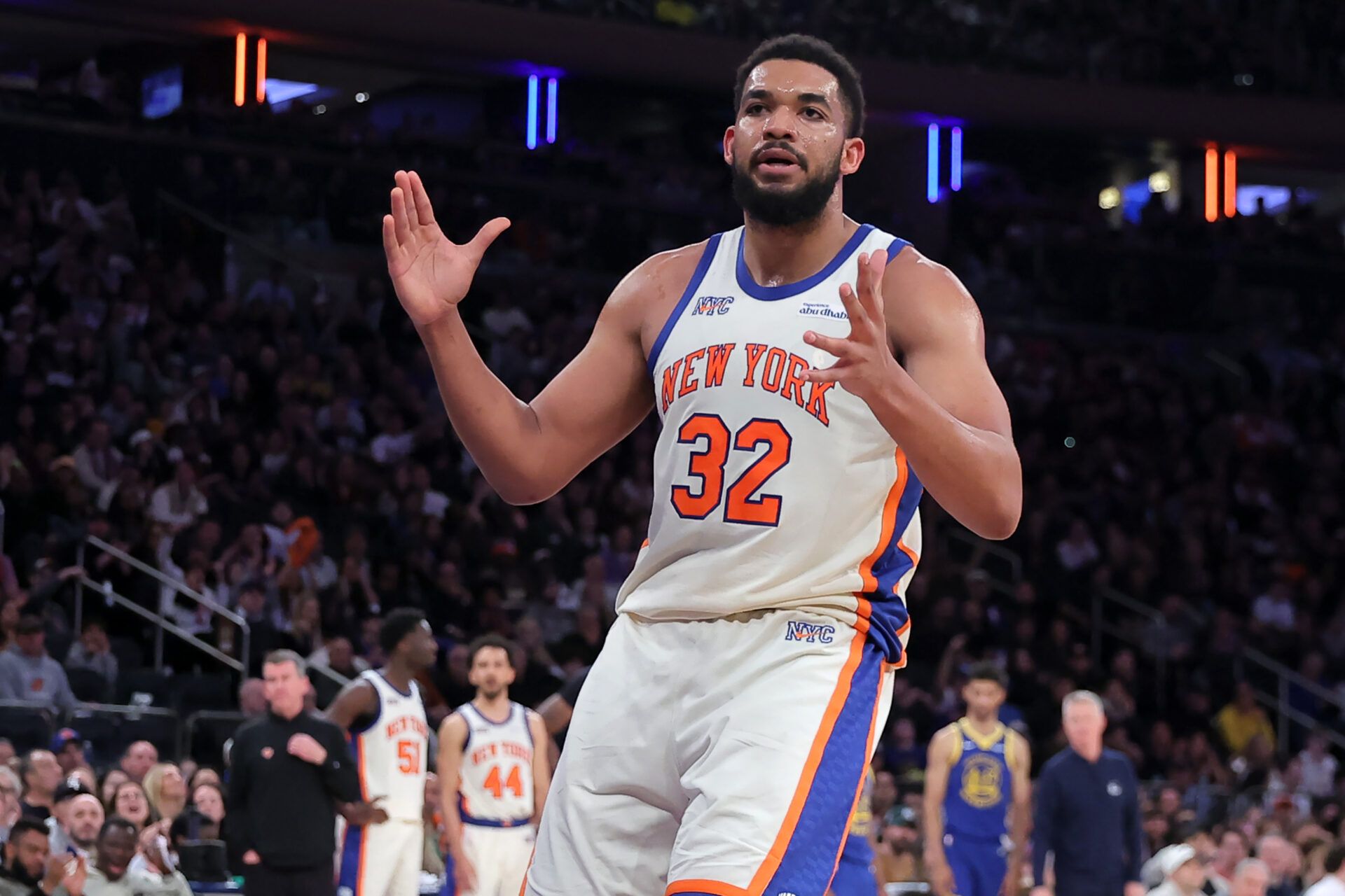 New York Knicks center Karl-Anthony Towns (32) reacts during the third quarter against the Golden State Warriors at Madison Square Garden.