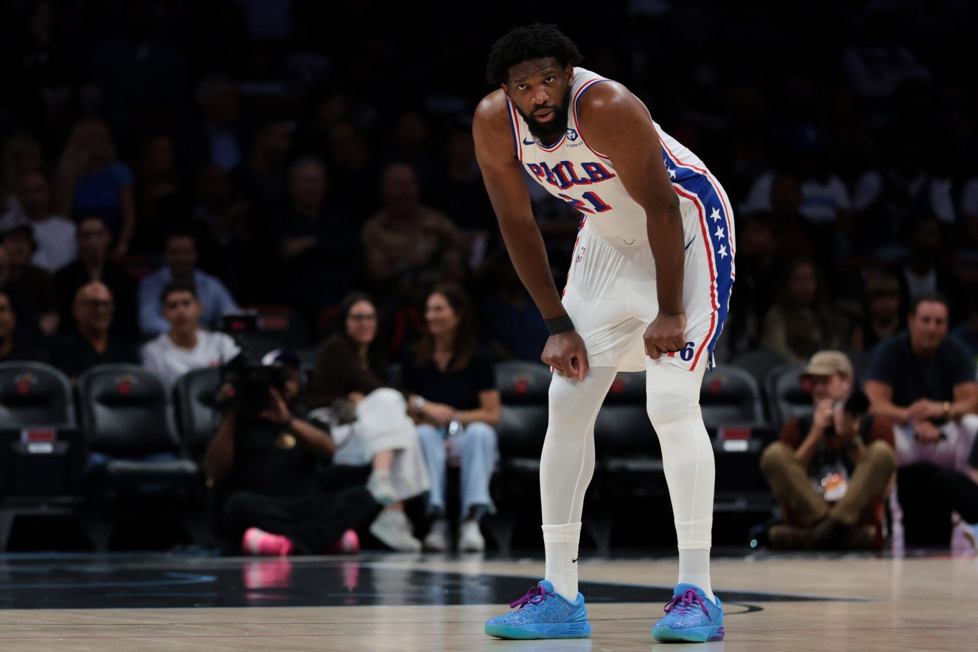 Philadelphia 76ers center Joel Embiid (21) looks on against the Miami Heat during the first quarter at Kaseya Center.