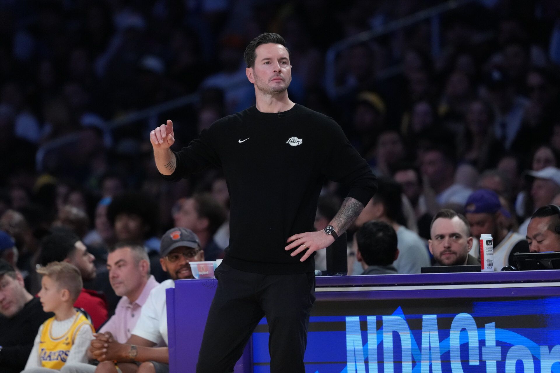 Los Angeles Lakers head coach JJ Redick watches against the New York Knicks in the first half at Crypto.com Arena.