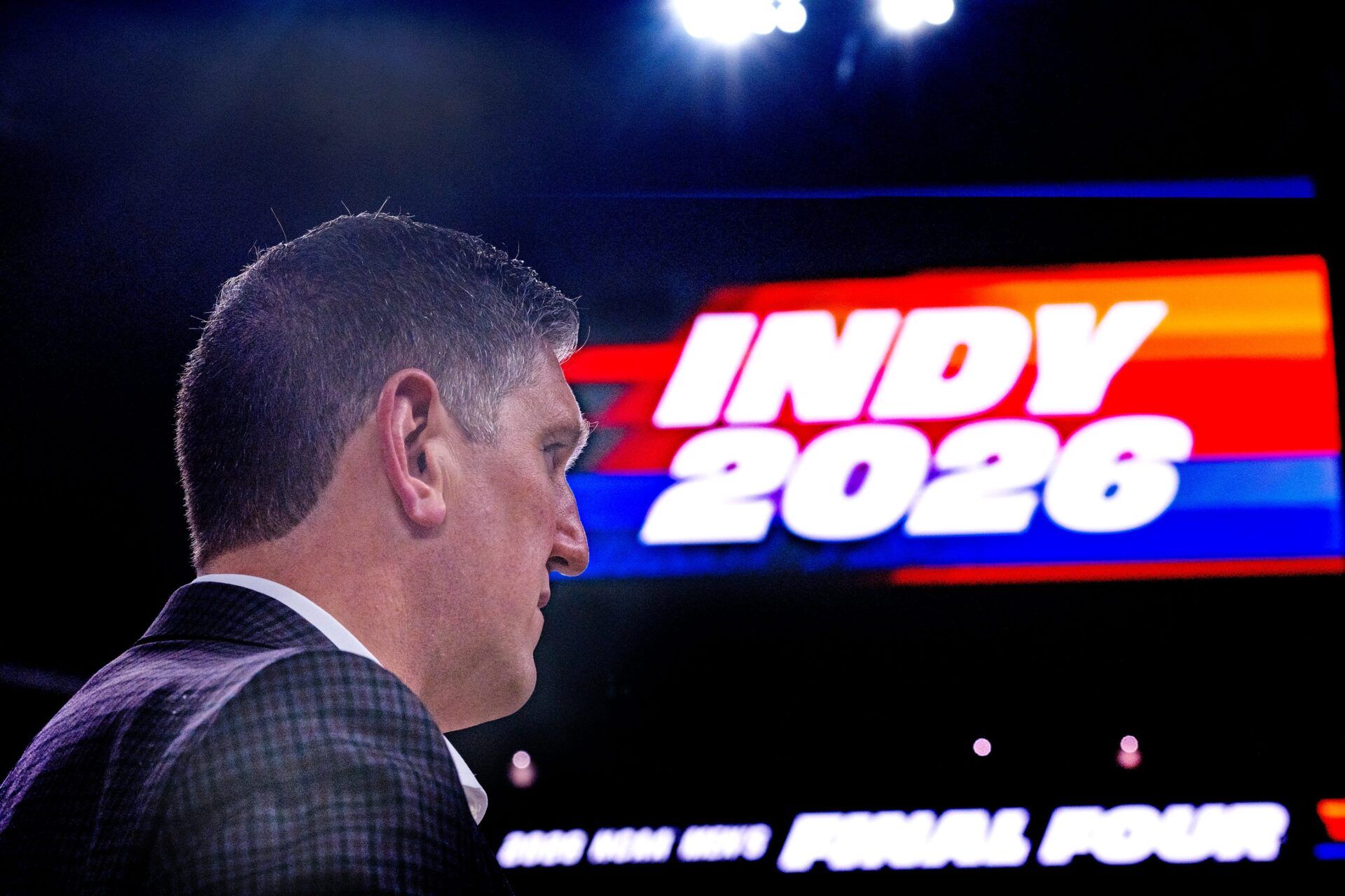 Lucas Oil Stadium General Manager Eric Neuburger watches as workers install the Final Four Mens Basketball tournament floor Friday, March 27, 2026 at Lucas Oil Stadium.