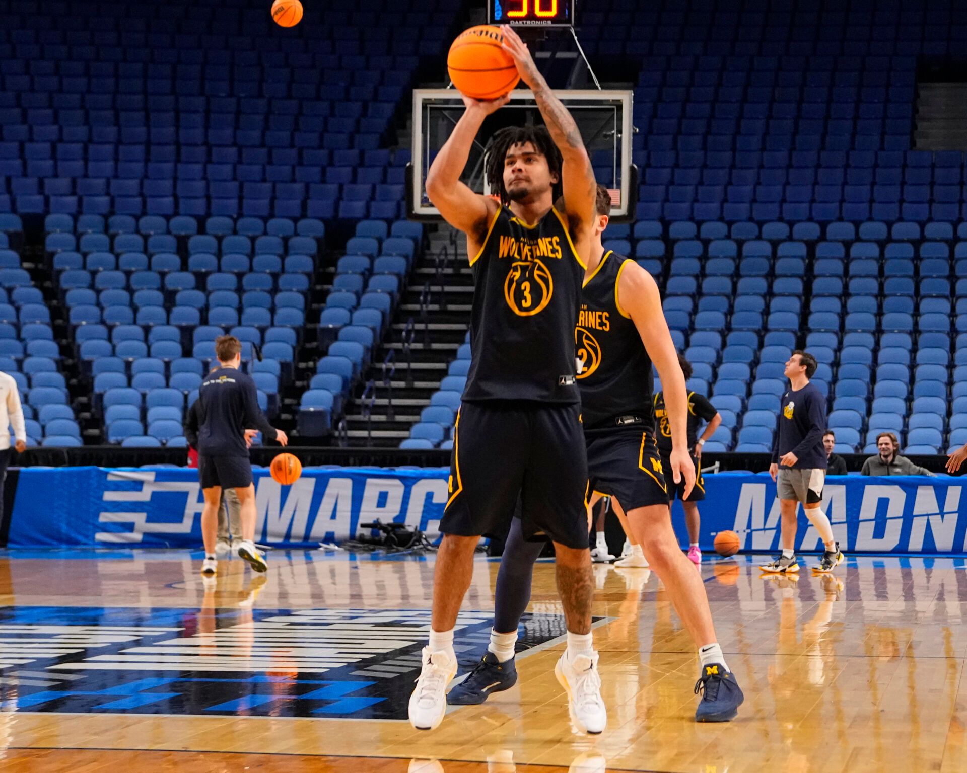 Michigan Wolverines guard Elliot Cadeau (3) shoots the ball during a practice session ahead of the first round of the men's 2026 NCAA Tournament at Keybank Center.