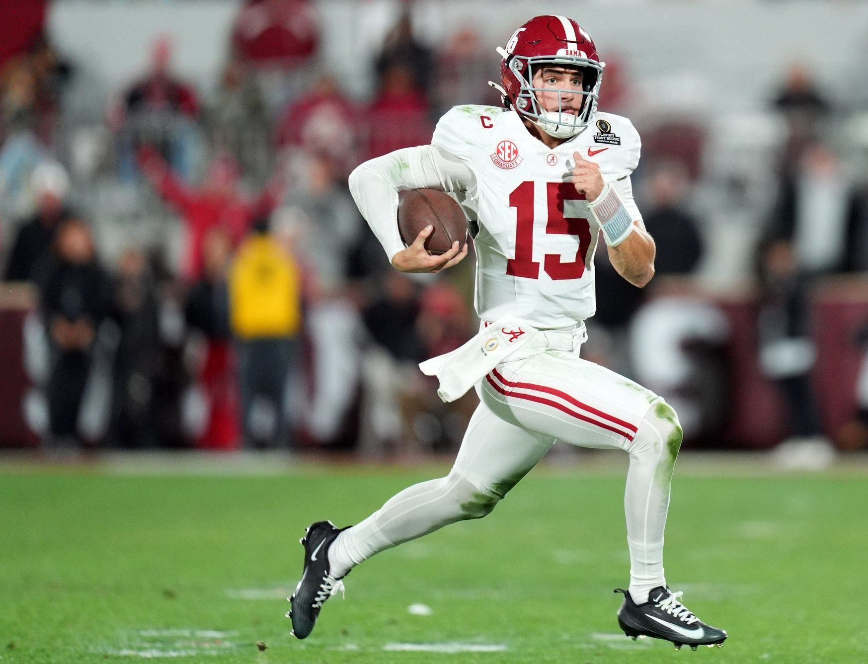 Alabama's Ty Simpson (15) rushes in the second half of the College Football Playoff game between the University of Oklahoma Sooners (OU) and the Alabama Crimson Tide at the Gaylord Family - Oklahoma Memorial Stadium in Norman, Okla., Friday Dec. 19, 2025.