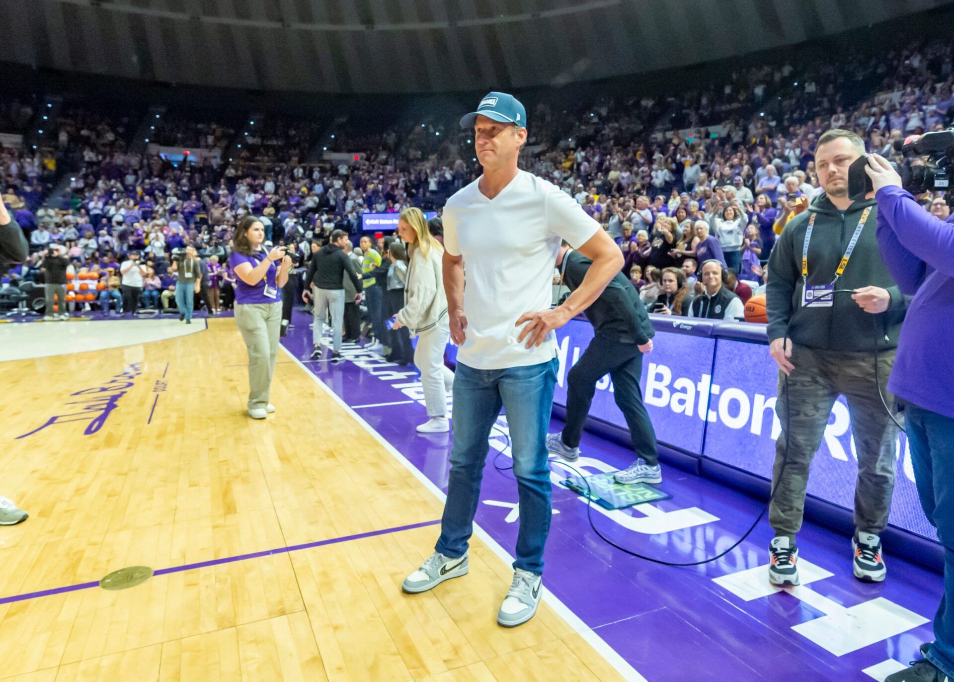LSU Football Coach Lane Kiffin walks out with Tigers Basketball Coach Kim Mulkey, LSU Tigers Womens Basketball takes on the Kentucky Wildcats. Thursday, Jan. 1, 2026.
