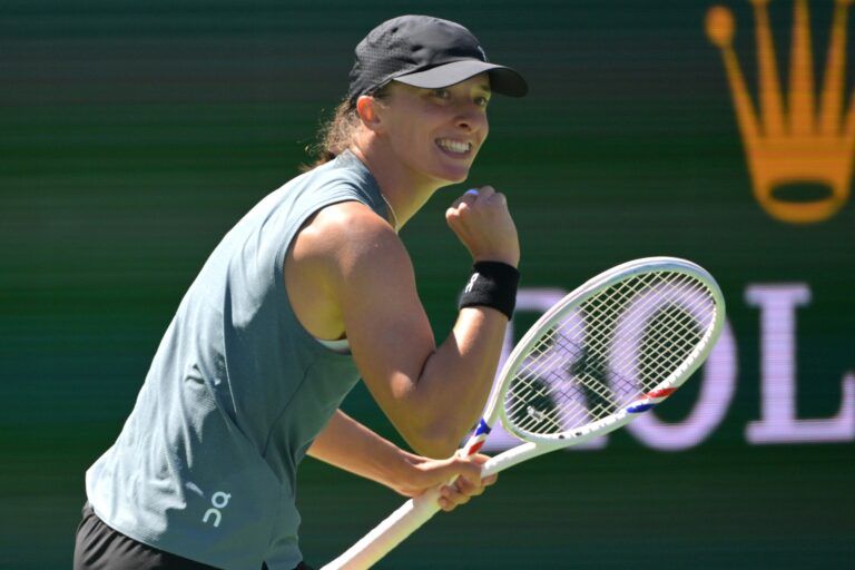 Iga Swiatek (POL) reacts as she defeated Karolina Muchova (CZE) during the fourth round in the BNP Paribas Open at the Indian Wells Tennis Garden.