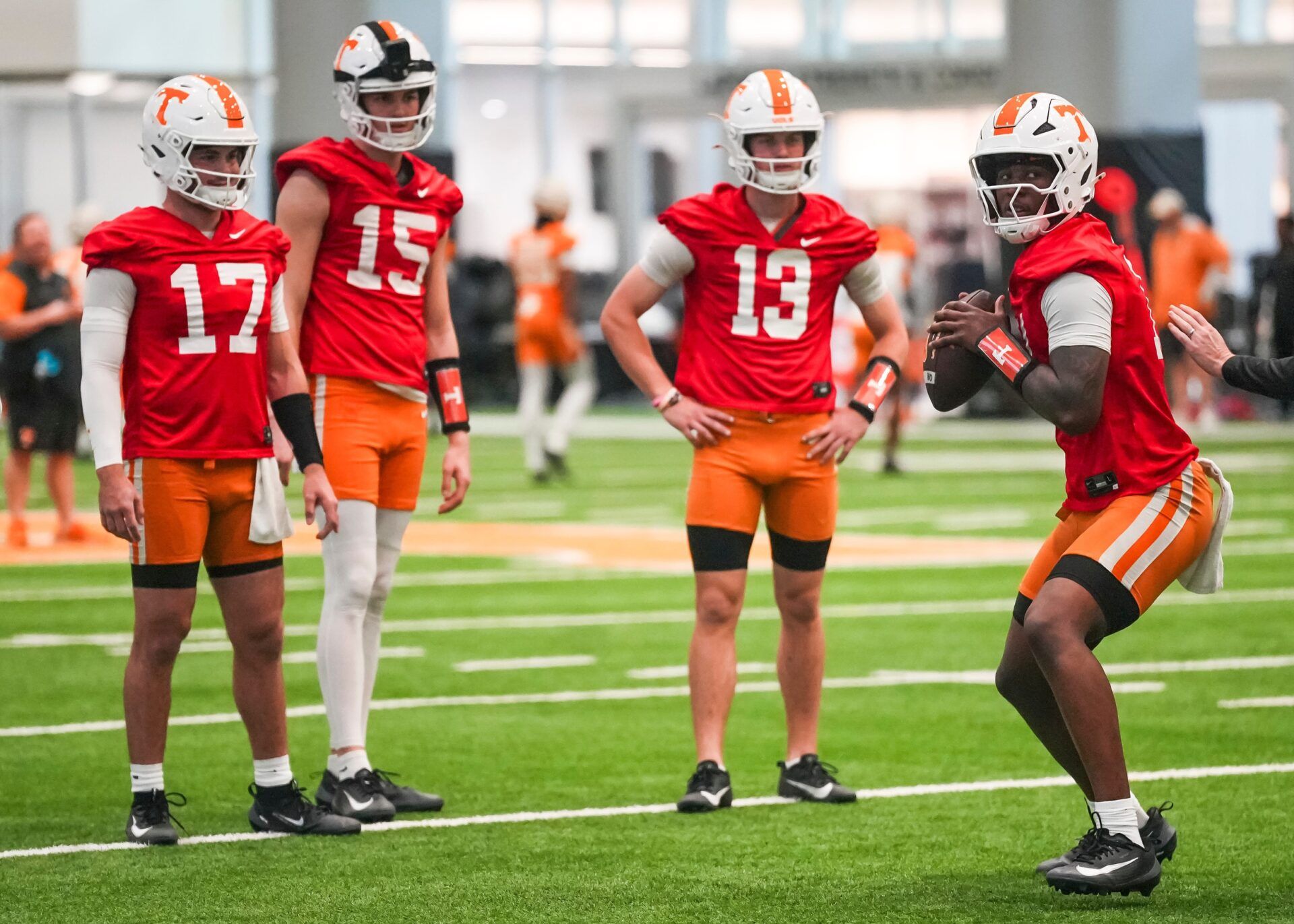 Tennessee quarterbacks, from left, Ryan Staub (17), George MacIntyre (15), Mason Phillips (13) and Faizon Brandon (11) during the Vols' first spring football practice in Knoxville on March 16, 2026.