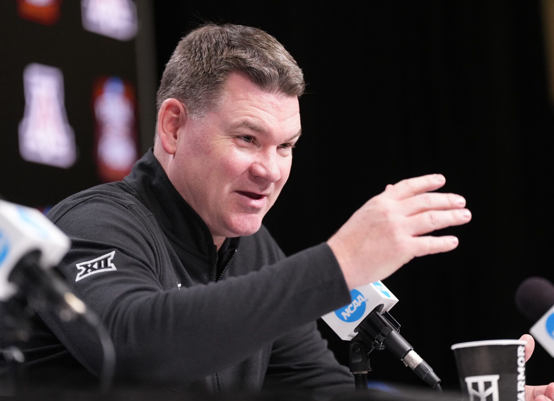 Arizona head coach Tommy Lloyd during a press conference ahead of the Final Four of the men's 2026 NCAA Tournament at Lucas Oil Stadium.