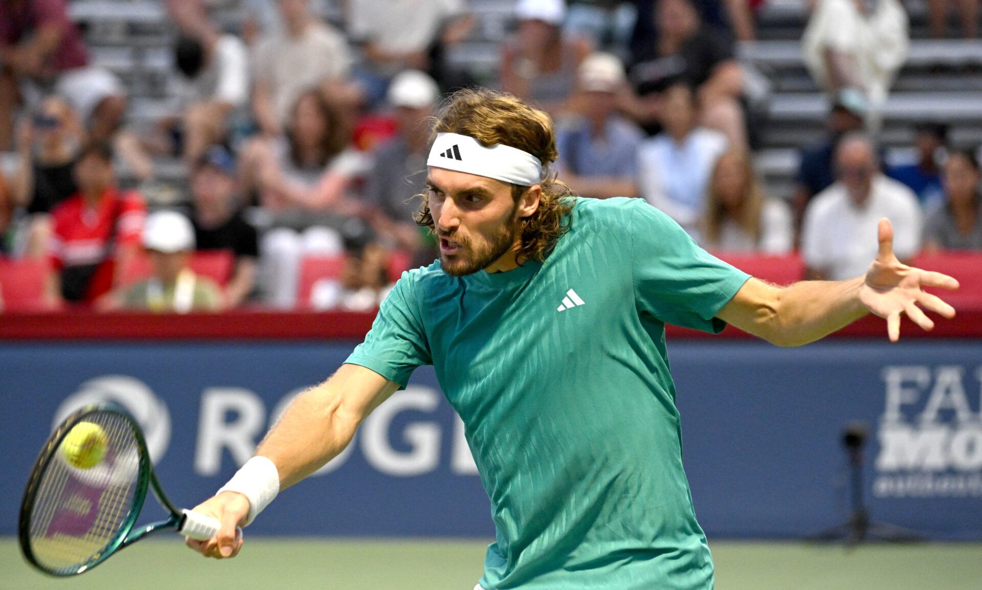 Stefanos Tsitsipas (GRE) plays a shot against Christopher O'Connell (AUS) during second round play at Sobeys Stadium.