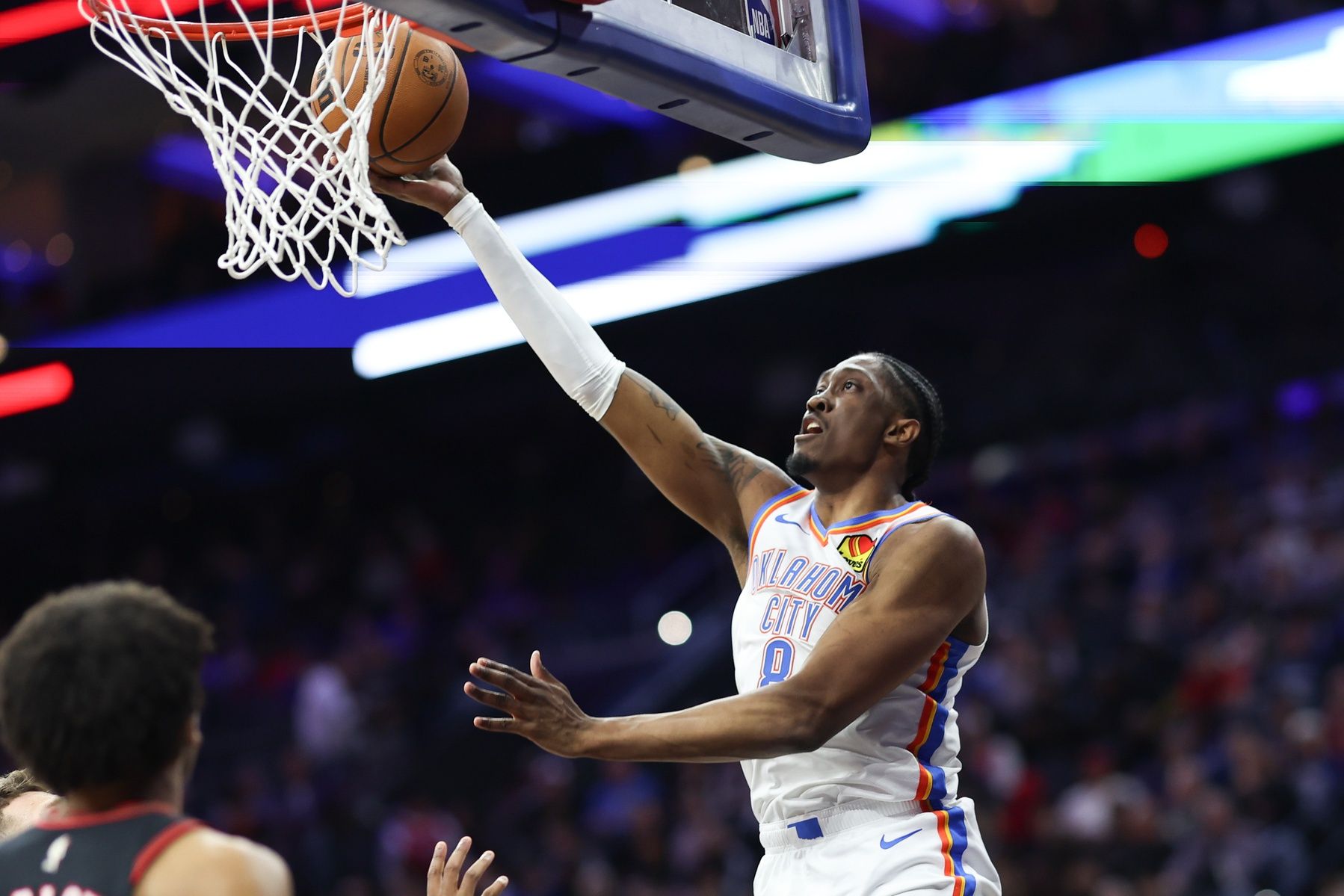 Oklahoma City Thunder guard Jalen Williams (8) scores against the Philadelphia 76ers during the third quarter at Xfinity Mobile Arena.