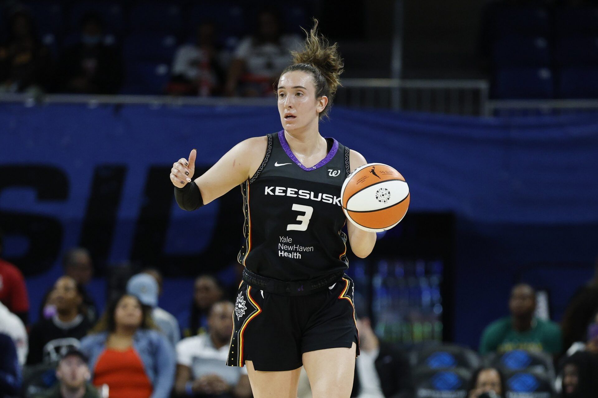 Connecticut Sun guard Marina Mabrey (3) brings the ball up court against the Chicago Sky during the first half at Wintrust Arena.