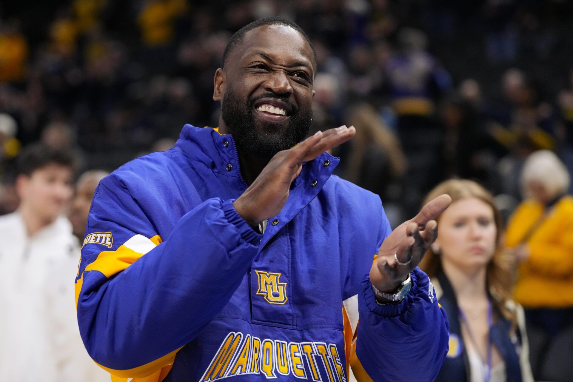 Former Marquette player Dwyane Wade looks on prior to the game against the Butler Bulldogs at Fiserv Forum.