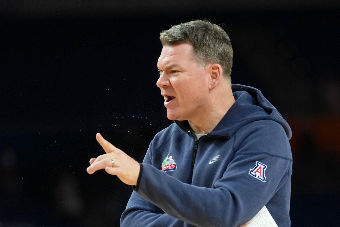 Arizona Wildcats head coach Tommy Lloyd directs players during a practice session ahead of the Final Four of the men's 2026 NCAA Tournament at Lucas Oil Stadium.