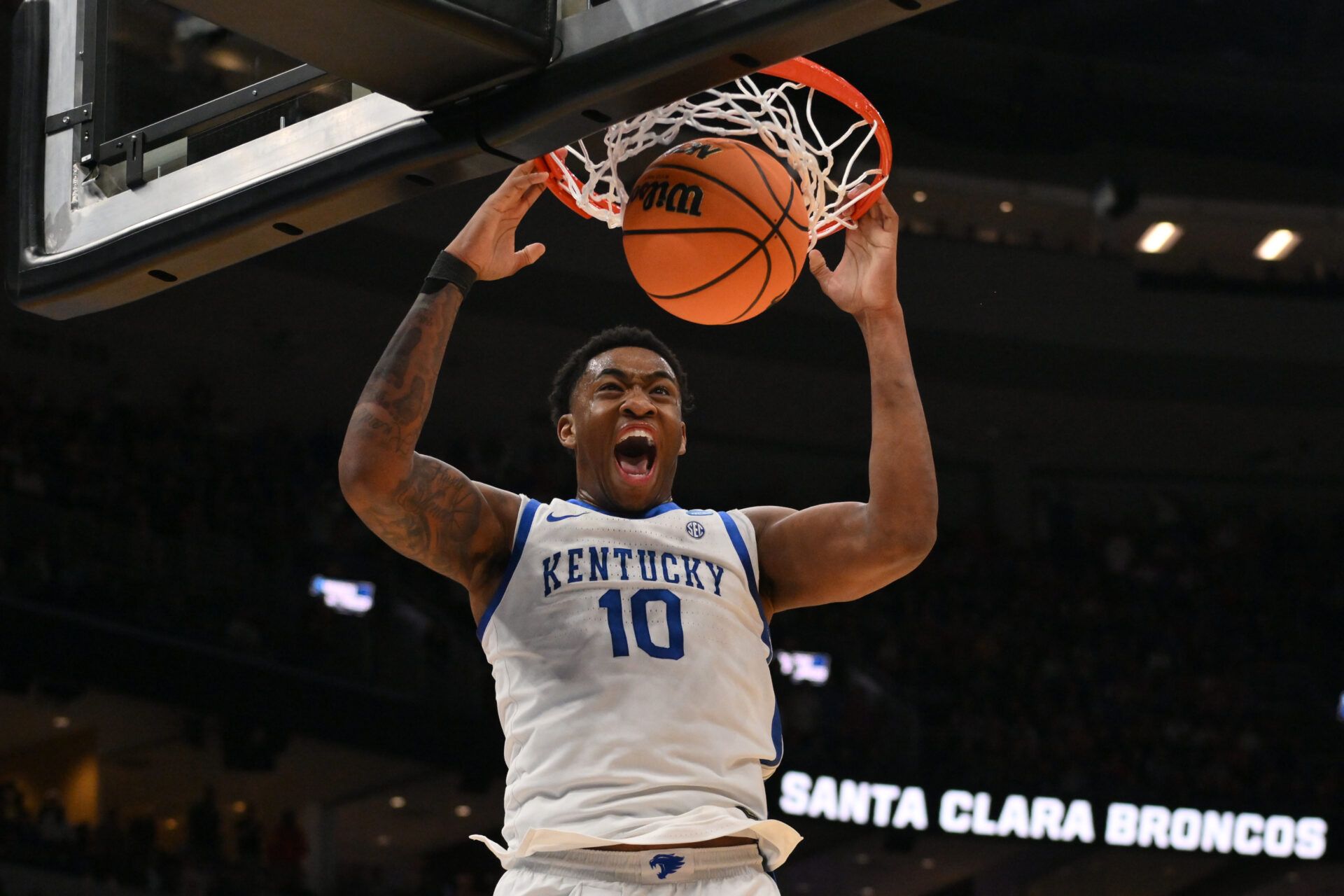 Kentucky Wildcats forward Brandon Garrison (10) dunks the ball against the Santa Clara Broncos during the overtime period of a first round game of the men's 2026 NCAA Tournament at Enterprise Center.
