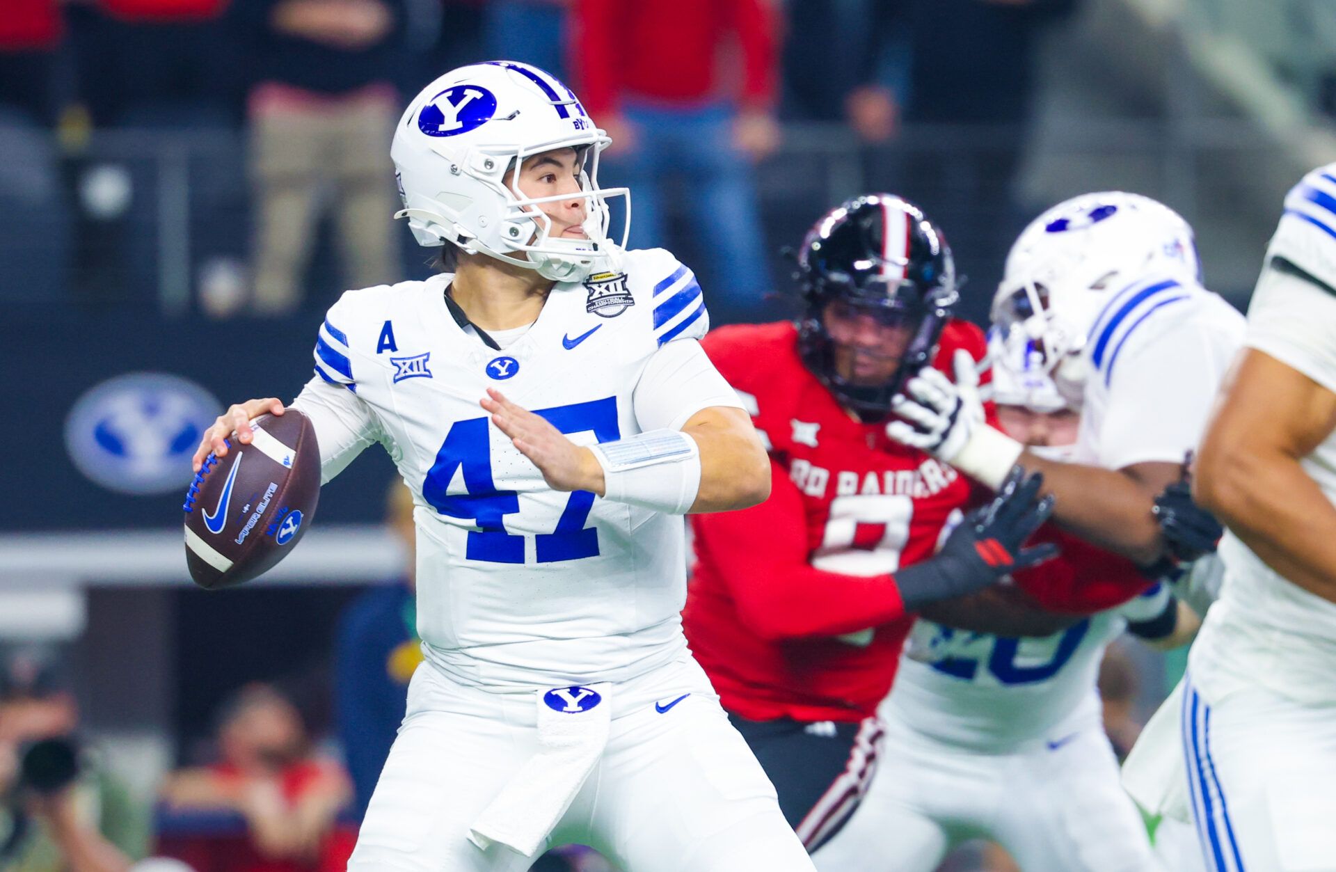BYU Cougars quarterback Bear Bachmeier (47) throws during the first quarter against the Texas Tech Red Raiders at AT&T Stadium.