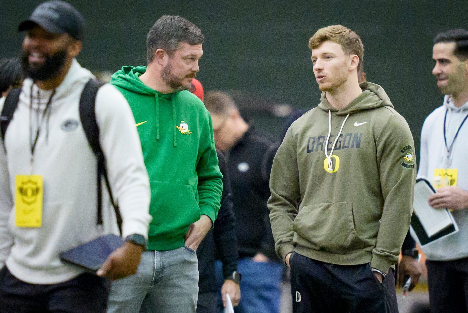 Oregon head coach Dan Lanning, left, talks to defensive back Dillon Thieneman during Oregon Pro Day on March 17, 2026, at the Moshofsky Center in Eugene, Oregon.