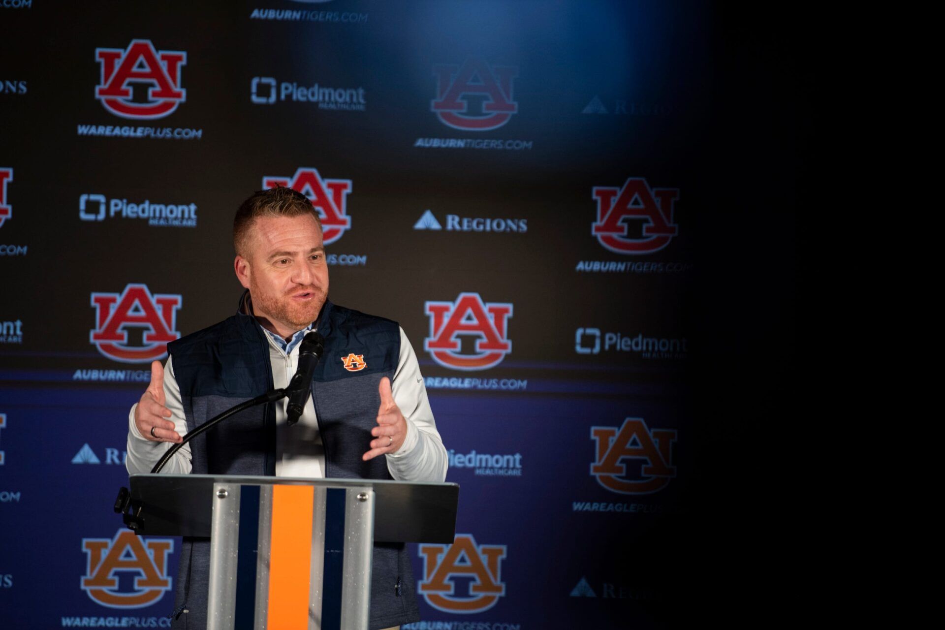 Auburn Tigers football head coach Alex Golesh speaks during a press conference at Woltosz Performance Center in Auburn, Ala. on Monday, Dec. 8, 2025.