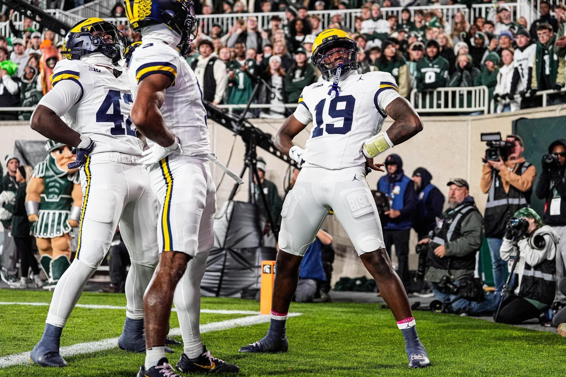 Michigan quarterback Bryce Underwood (19) celebrates a touchdown against Michigan State during the first half at Spartan Stadium in East Lansing on Saturday, October 25, 2025.