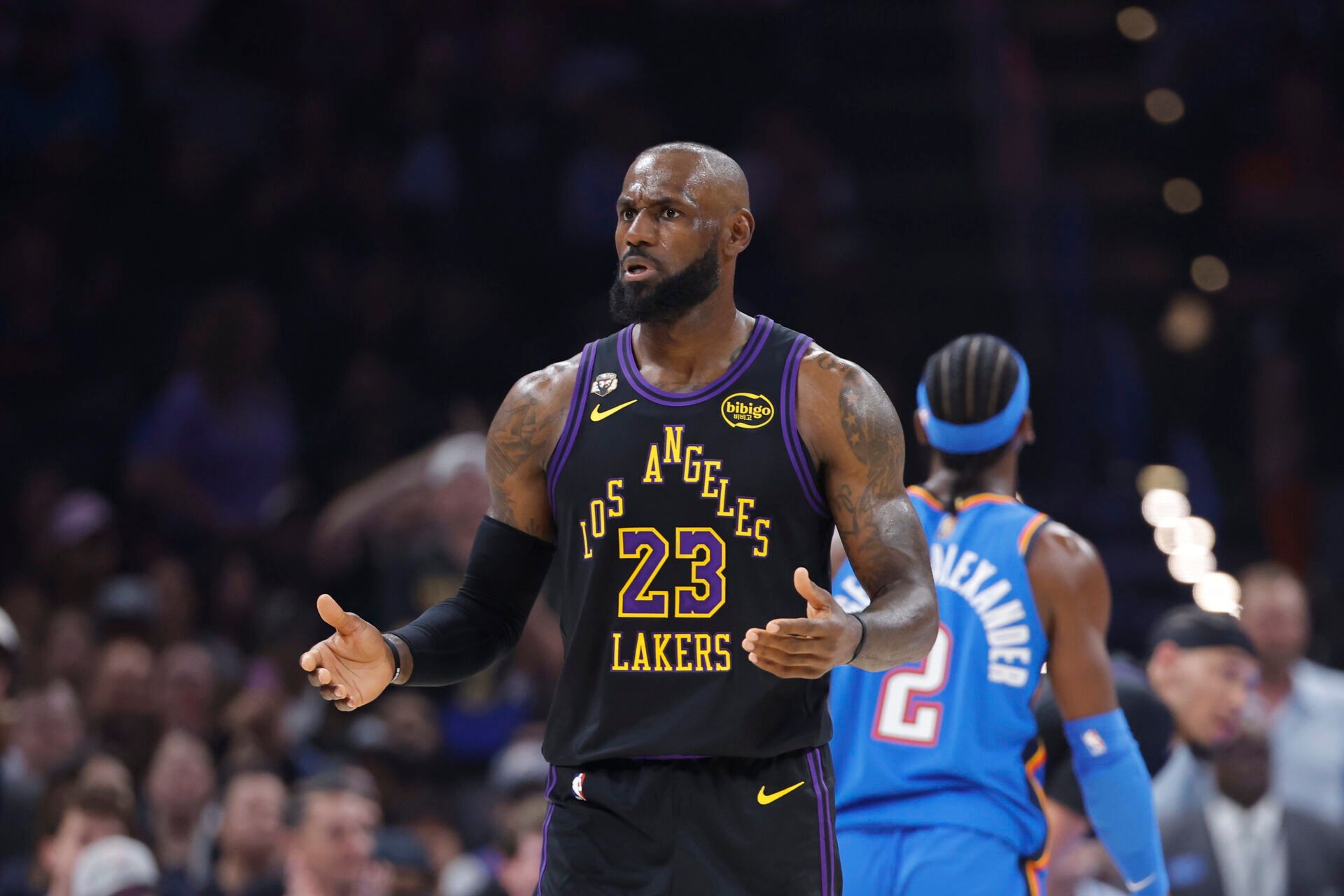Los Angeles Lakers forward LeBron James (23) reacts after a call against hindering a play against the Oklahoma City Thunder in the first quarter at Paycom Center.