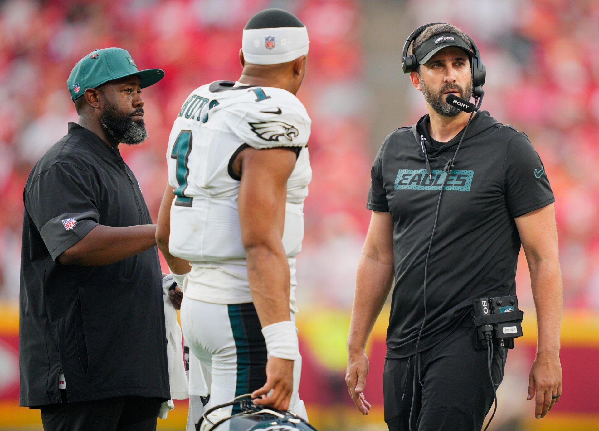 Philadelphia Eagles head coach Nick Sirianni speaks with quarterback Jalen Hurts (1) during the fourth quarter of the game against the Kansas City Chiefs at GEHA Field at Arrowhead Stadium.