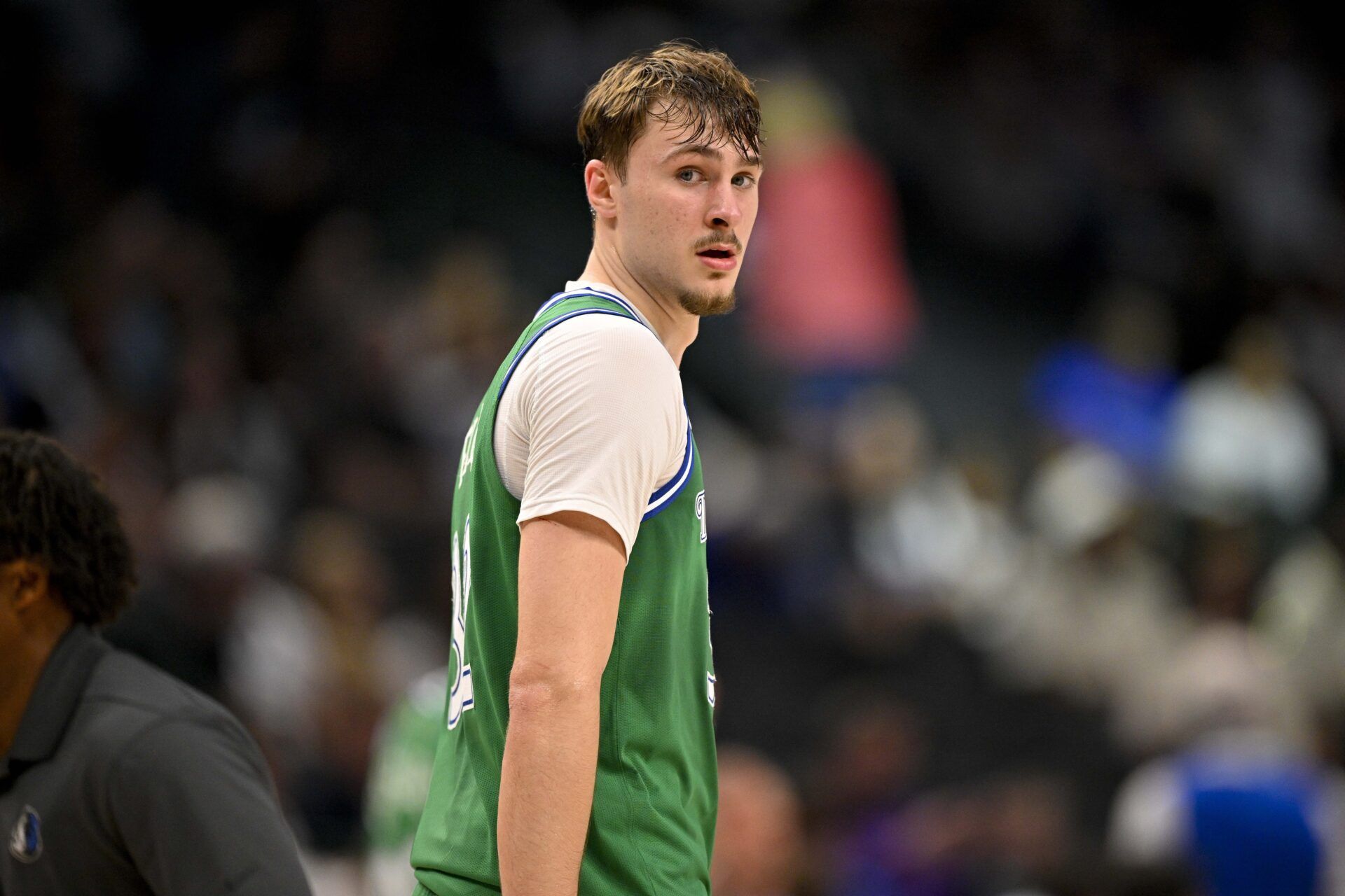 Dallas Mavericks forward Cooper Flagg (32) looks back as he reenters the game against the Orlando Magic during the fourth quarter at the American Airlines Center.