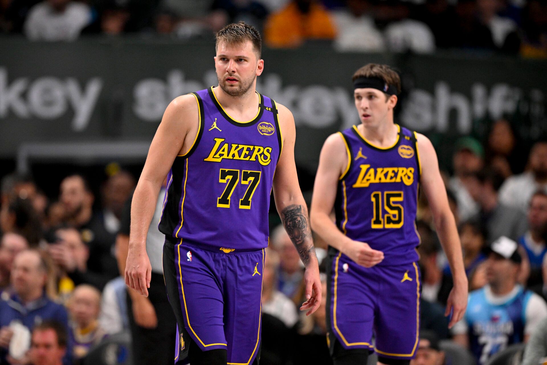 Los Angeles Lakers guard Luka Doncic (77) and guard Austin Reaves (15) during the game between the Dallas Mavericks and the Los Angeles Lakers at American Airlines Center.