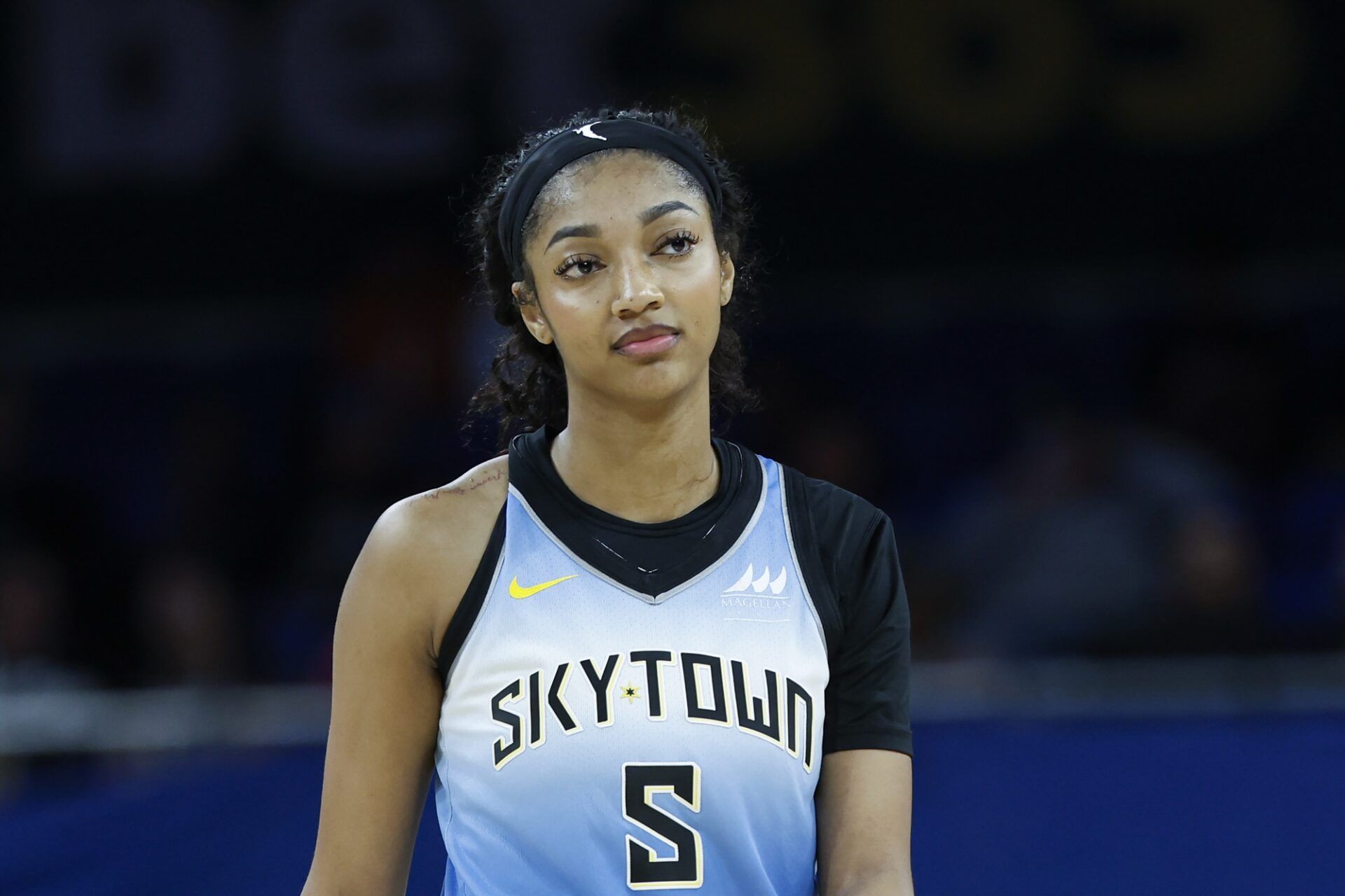 Chicago Sky forward Angel Reese (5) walks on the court during the second half of a WNBA game against the Connecticut Sun at Wintrust Arena.