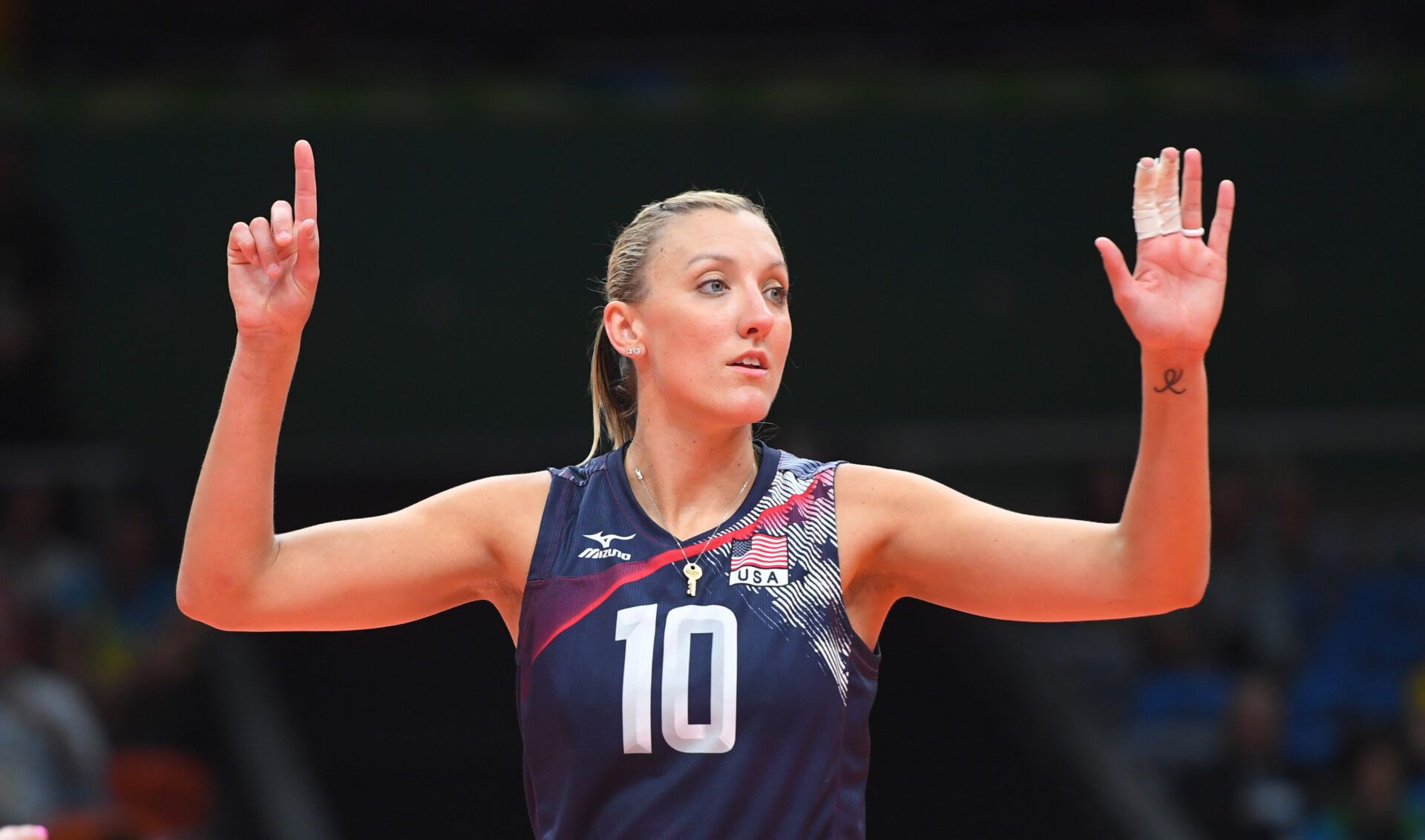 United States wing spiker Jordan Larson-Burbach (10) directs her teammates in a preliminary round Group B volleyball match against China at Maracanazinho during the Rio 2016 Summer Olympic Games.