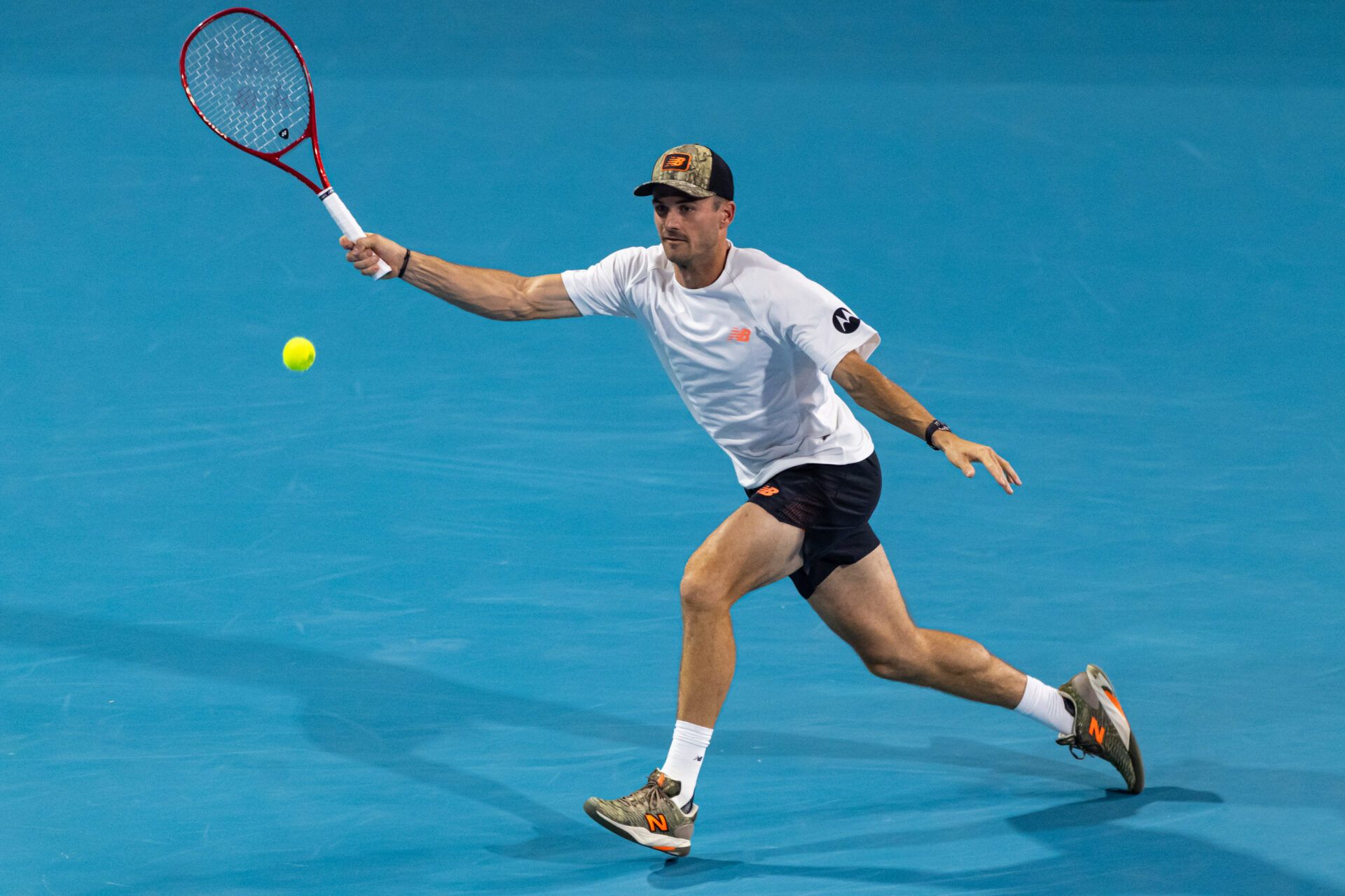Tommy Paul of the United States plays the ball during his match against Arthur Fils of France in the quarter finals of the men’s singles at the Miami Open at Hard Rock Stadium.