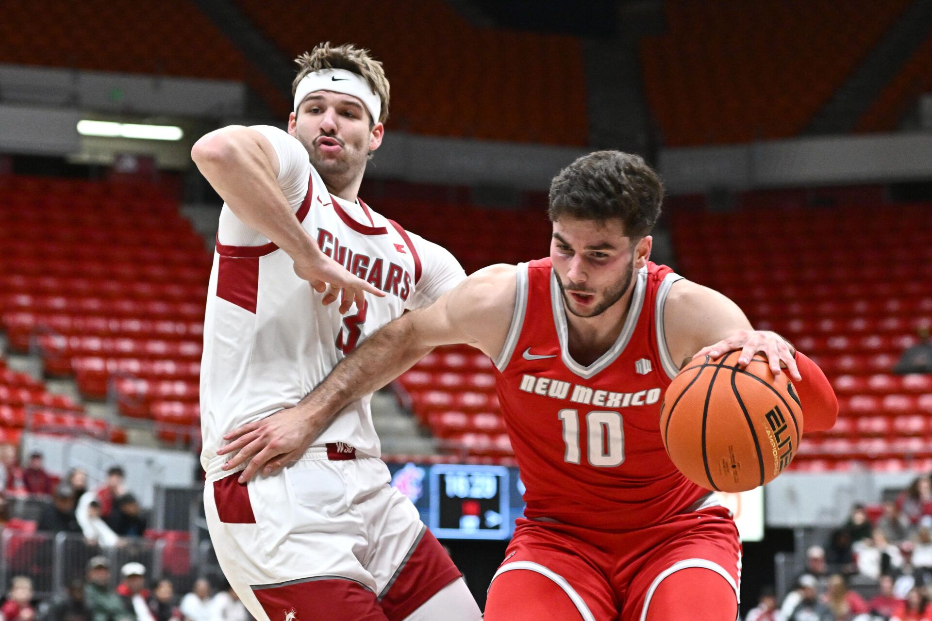 New Mexico Lobos forward Tomislav Buljan (10) runs the lane against Washington State Cougars forward Simon Hildebrandt (3) in the first half at Friel Court at Beasley Coliseum.