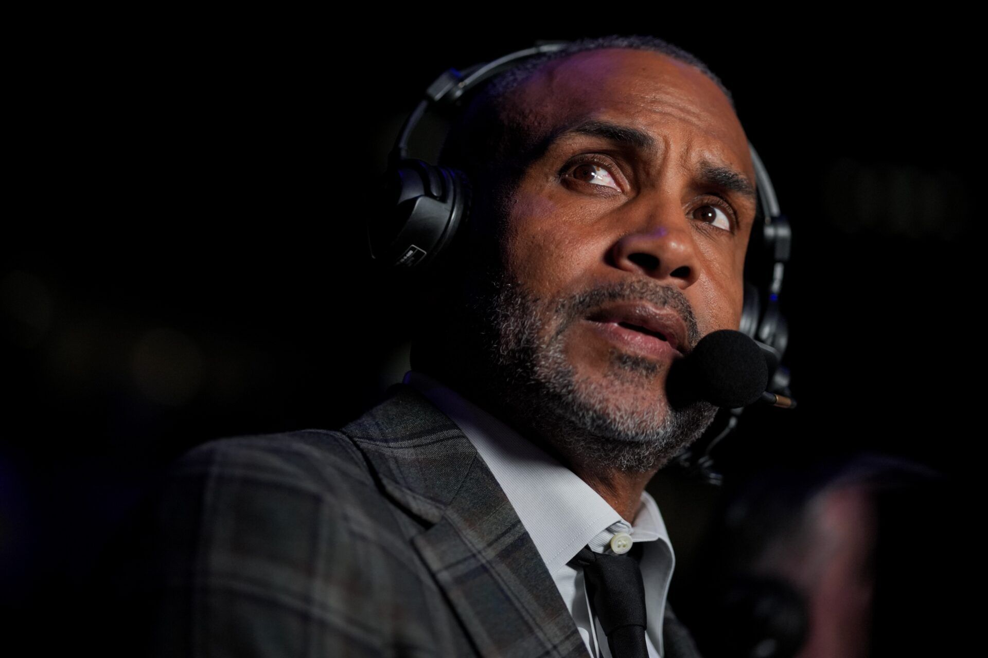 Television broadcaster and former NBA player Grant Hill looks on before the game between the St. John's Red Storm and the Xavier Musketeers at the Cintas Center.