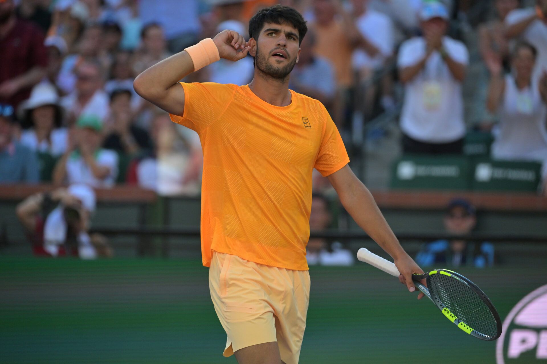Carlos Alcaraz (ESP) reacts to the crowd cheering after winning a point during his semifinal match against Daniil Medvedev (RUS) in the BNP Paribas Open at the Indian Wells Tennis Garden.