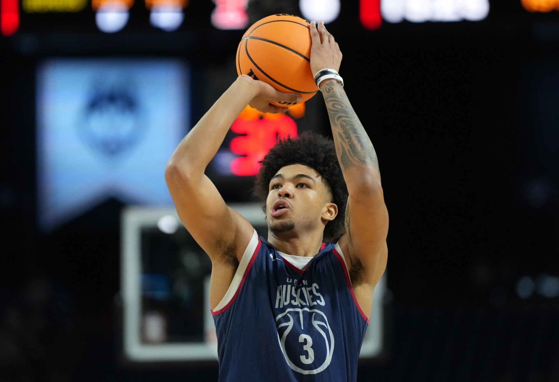 UConn Huskies forward Jaylin Stewart (3) shoots the ball during a practice session ahead of the Final Four of the men's 2026 NCAA Tournament at Lucas Oil Stadium.