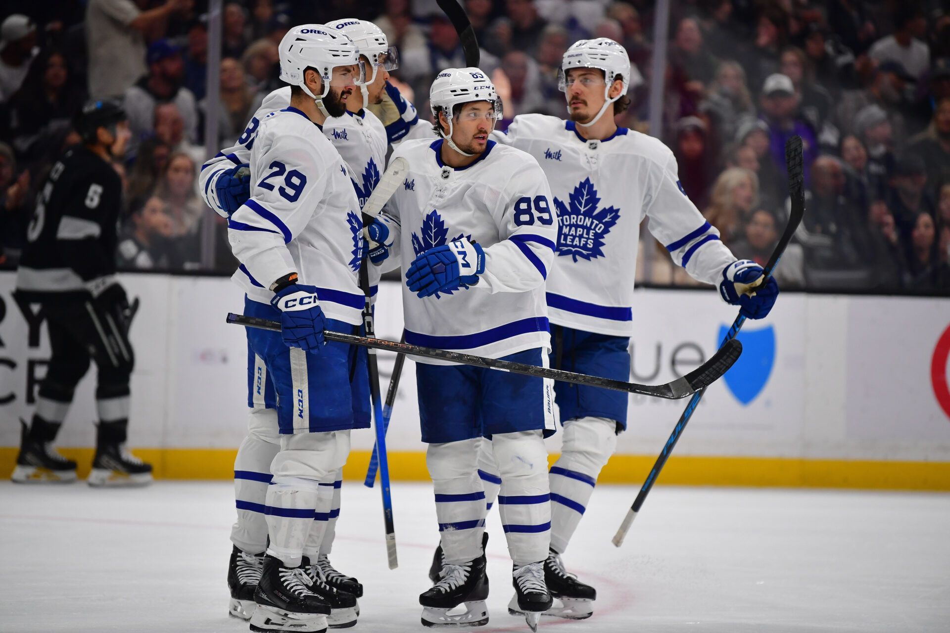 Toronto Maple Leafs celebrate the goal scored by left wing Nicholas Robertson (89) against the Los Angeles Kings during the third period at Crypto.com Arena.