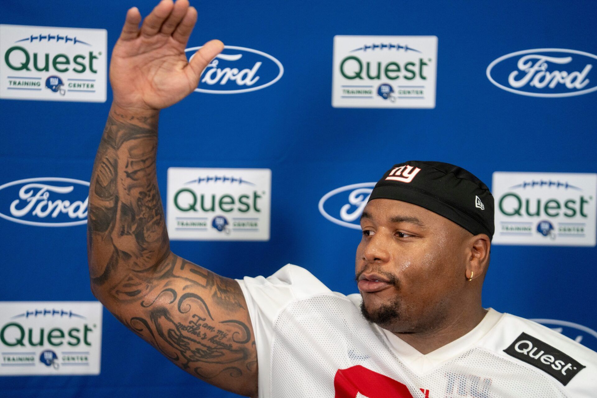New York Giants defensive tackle Dexter Lawrence II (97) speaks in a press conference during day one of the New York Giants training camp at Quest Diagnostics Giants Training Center in East Rutherford on Wednesday, July 23, 2025.