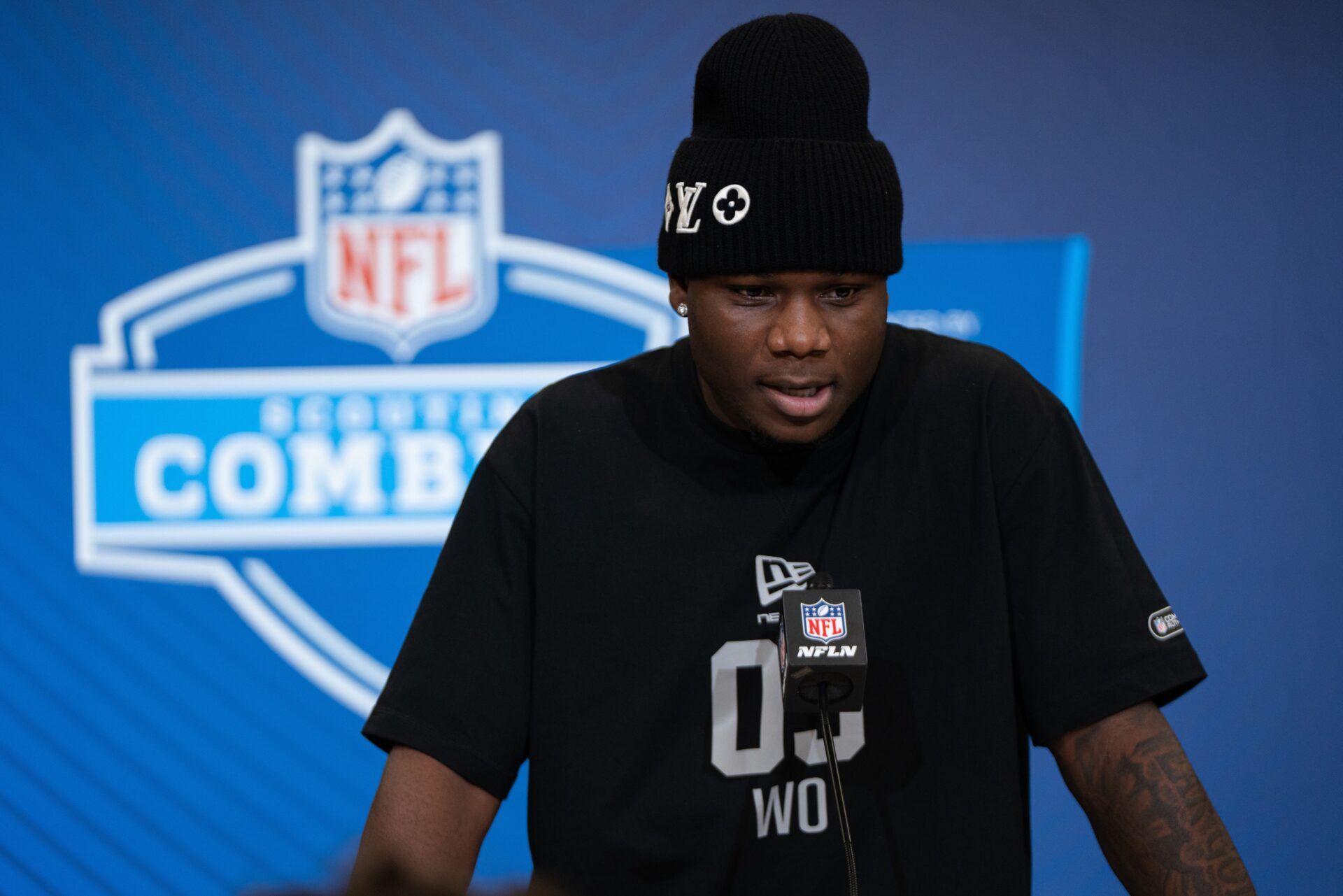Louisville wideout Chris Bell (WO03) speaks to members of the media during the NFL Combine at the Indiana Convention Center.
