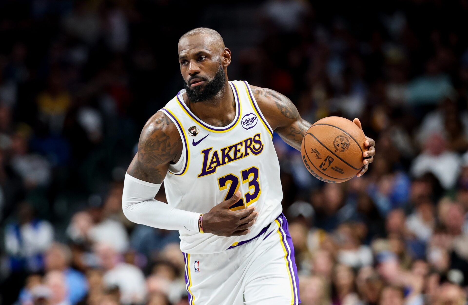 Los Angeles Lakers forward LeBron James (23) controls the ball against the Dallas Mavericks during the second half at American Airlines Center.
