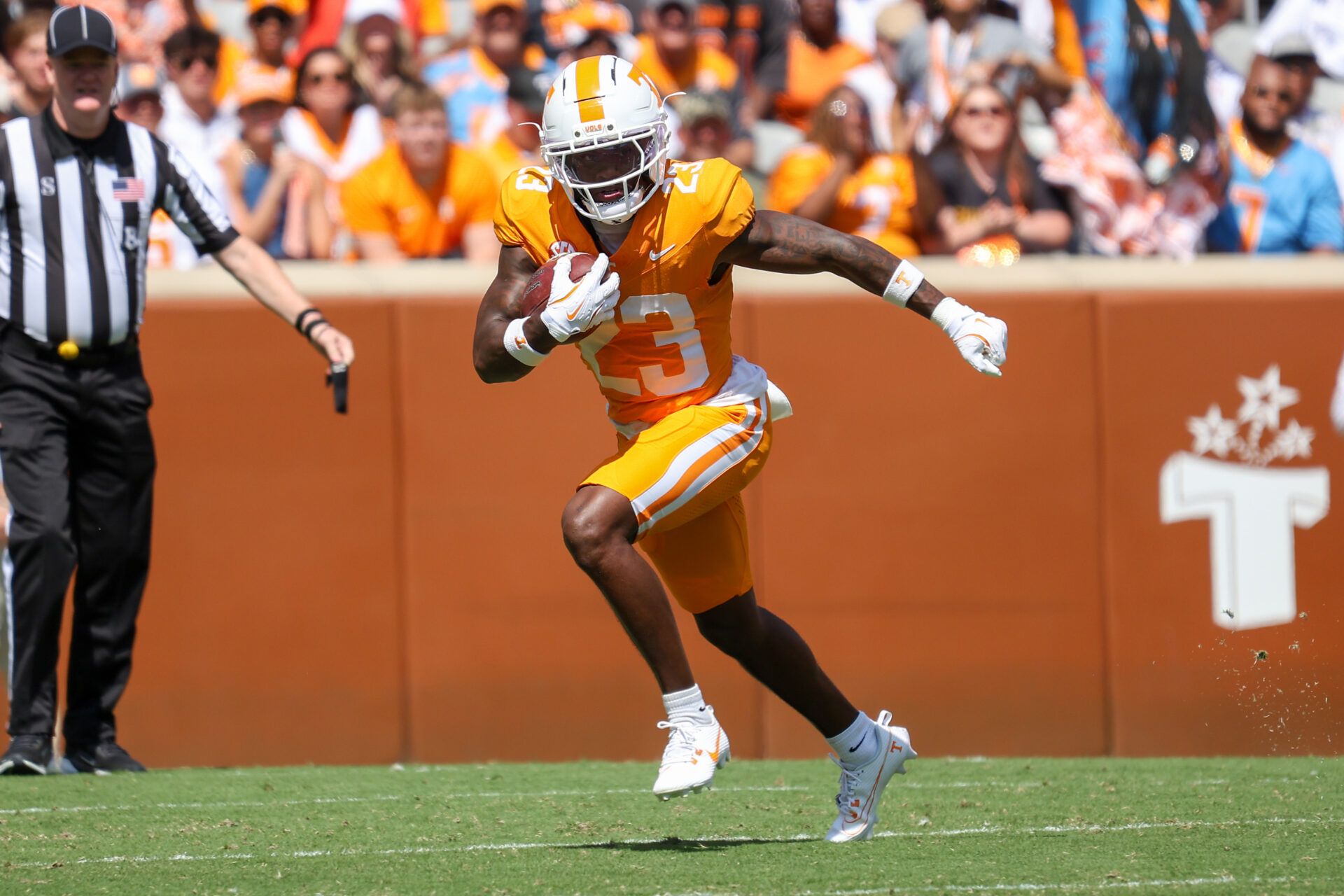 Tennessee Volunteers defensive back Boo Carter (23) returns a punt against the UAB Blazers during the first quarter at Neyland Stadium.