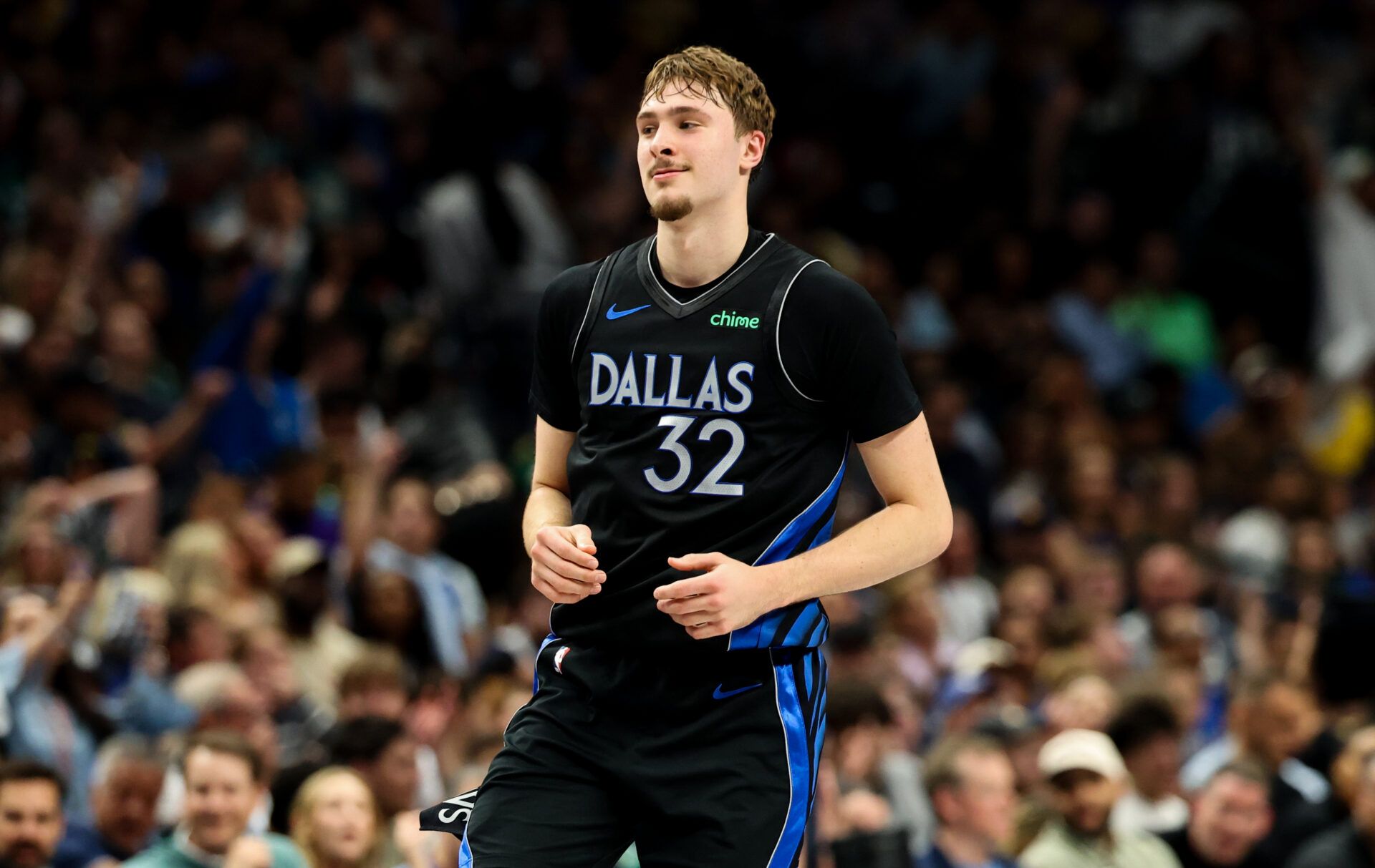 Dallas Mavericks forward Cooper Flagg (32) reacts after scoring during the first half against the Los Angeles Lakers at American Airlines Center.