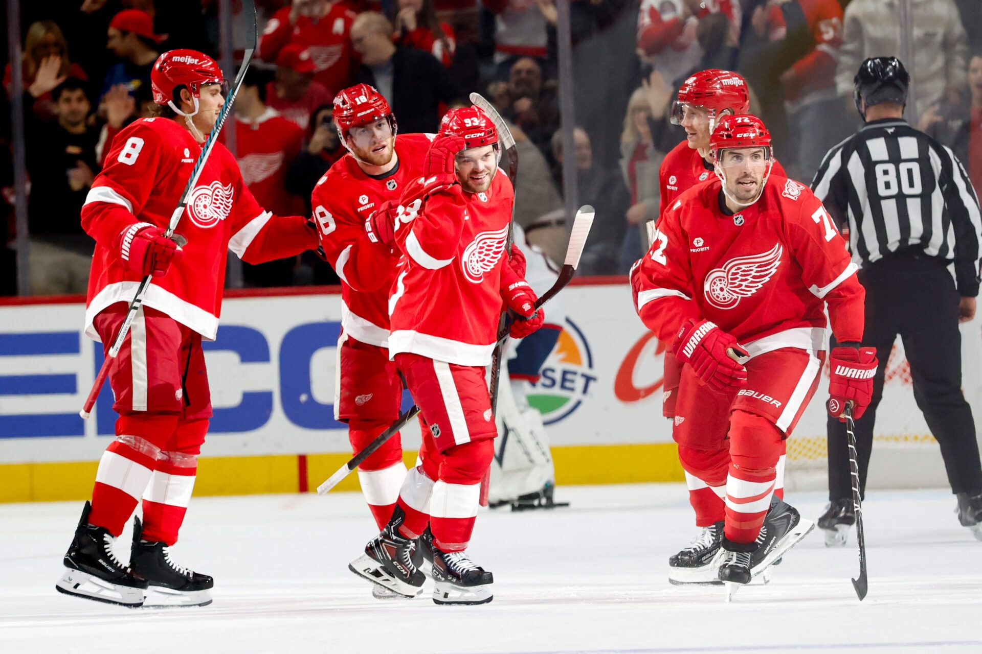 Detroit Red Wings defenseman Justin Faulk (72) receives congratulations from teammates after scoring in the third period against the Columbus Blue Jackets at Little Caesars Arena.