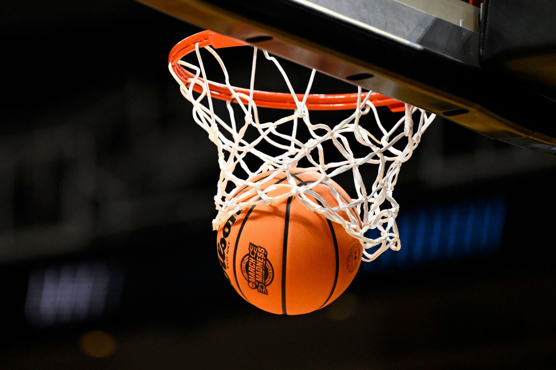 The March Madness logo is seen on a ball during a Texas Longhorns practice session ahead of the west regional of the men's 2026 NCAA Tournament at SAP Center.