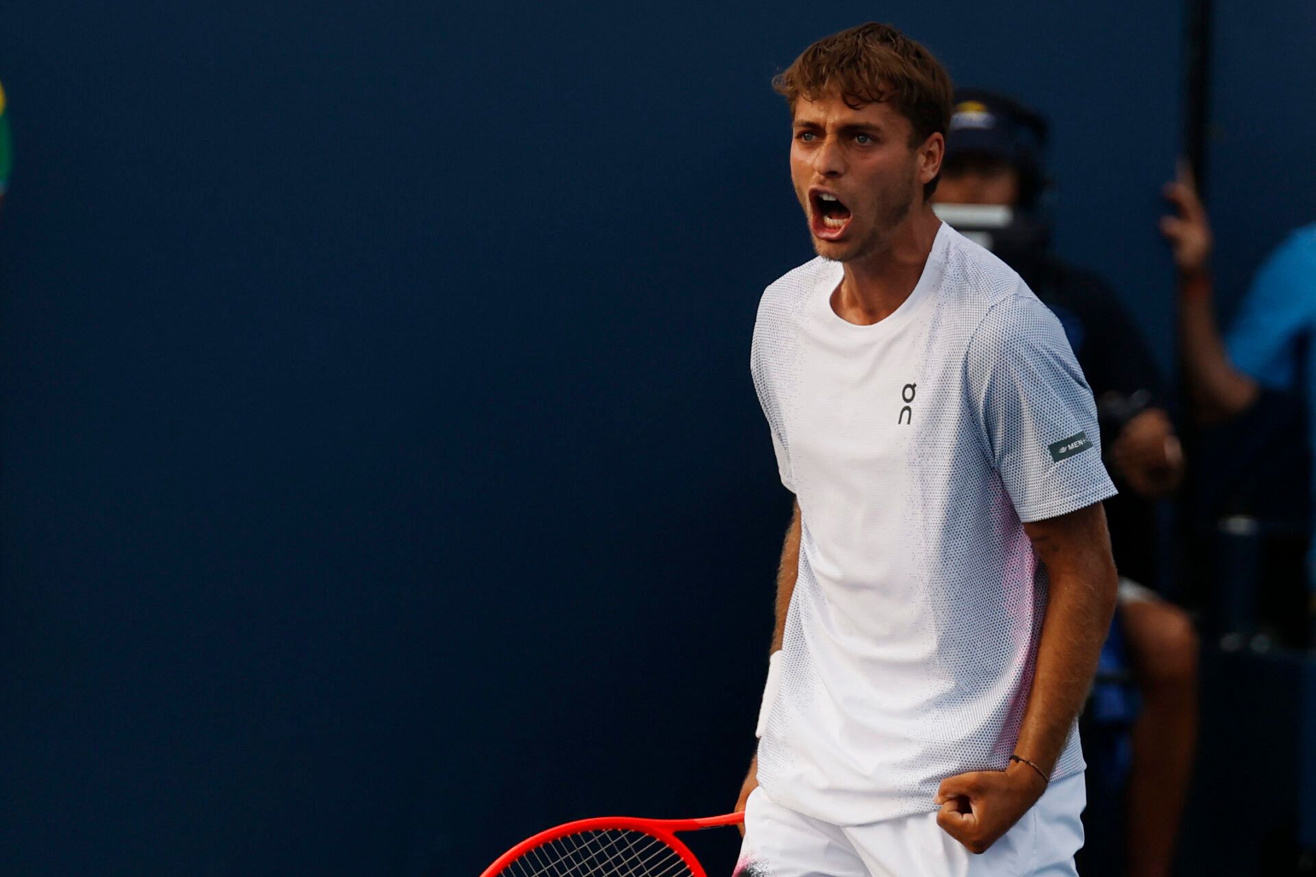 Flavio Cobolli (ITA) celebrates after match point against Francesco Passaro (ITA)(not pictured) on day two of the 2025 US Open tennis tournament at USTA Billie Jean King National Tennis Center.