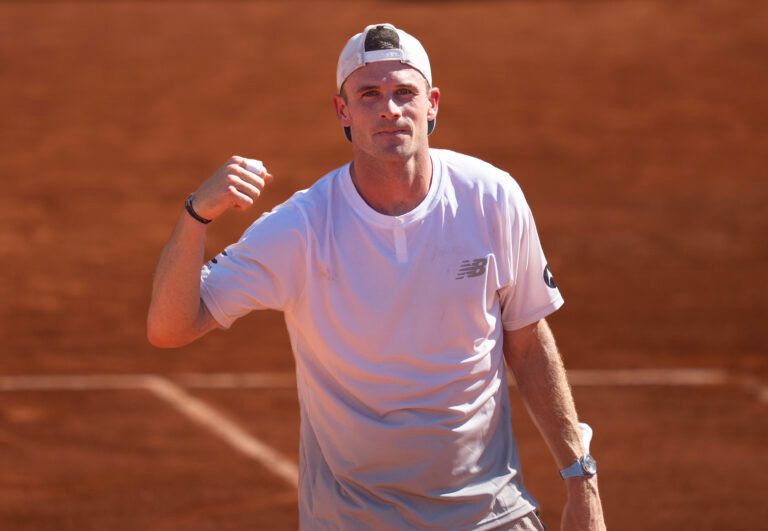 Tommy Paul of the United States celebrates winning his match against Karen Khachanov on day six at Roland Garros Stadium.